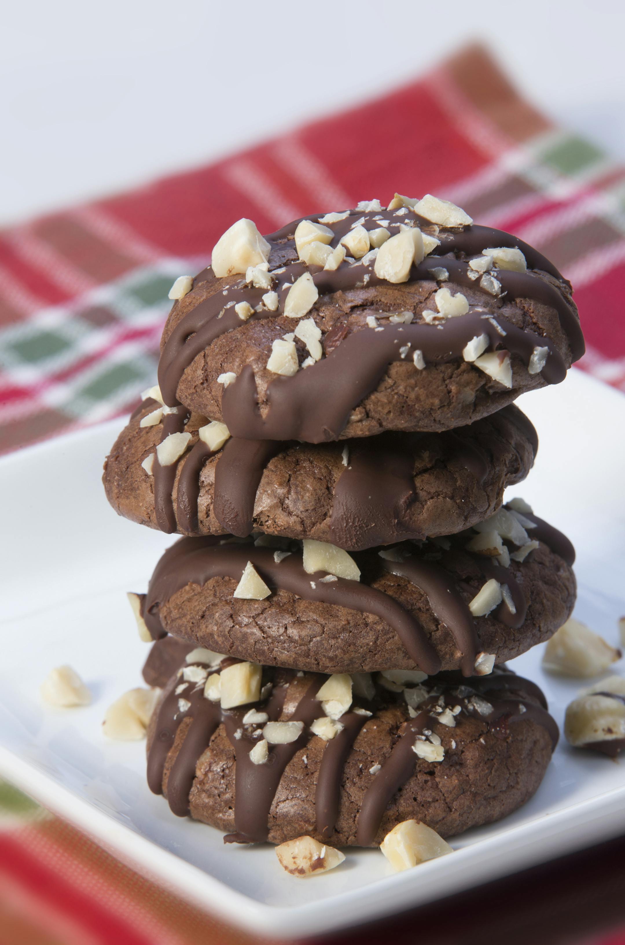 Caption for cookies: The 2014 Taste holiday cookie contest winners include: Italian Almond Cookies, Tart & Sassy Cranberry Lemon Drops; Chocolate Thumbprints; Macadamia Nut Tarts and Espresso-Hazelnut Truffle Cookies. The annual Star Tribune cooky contest