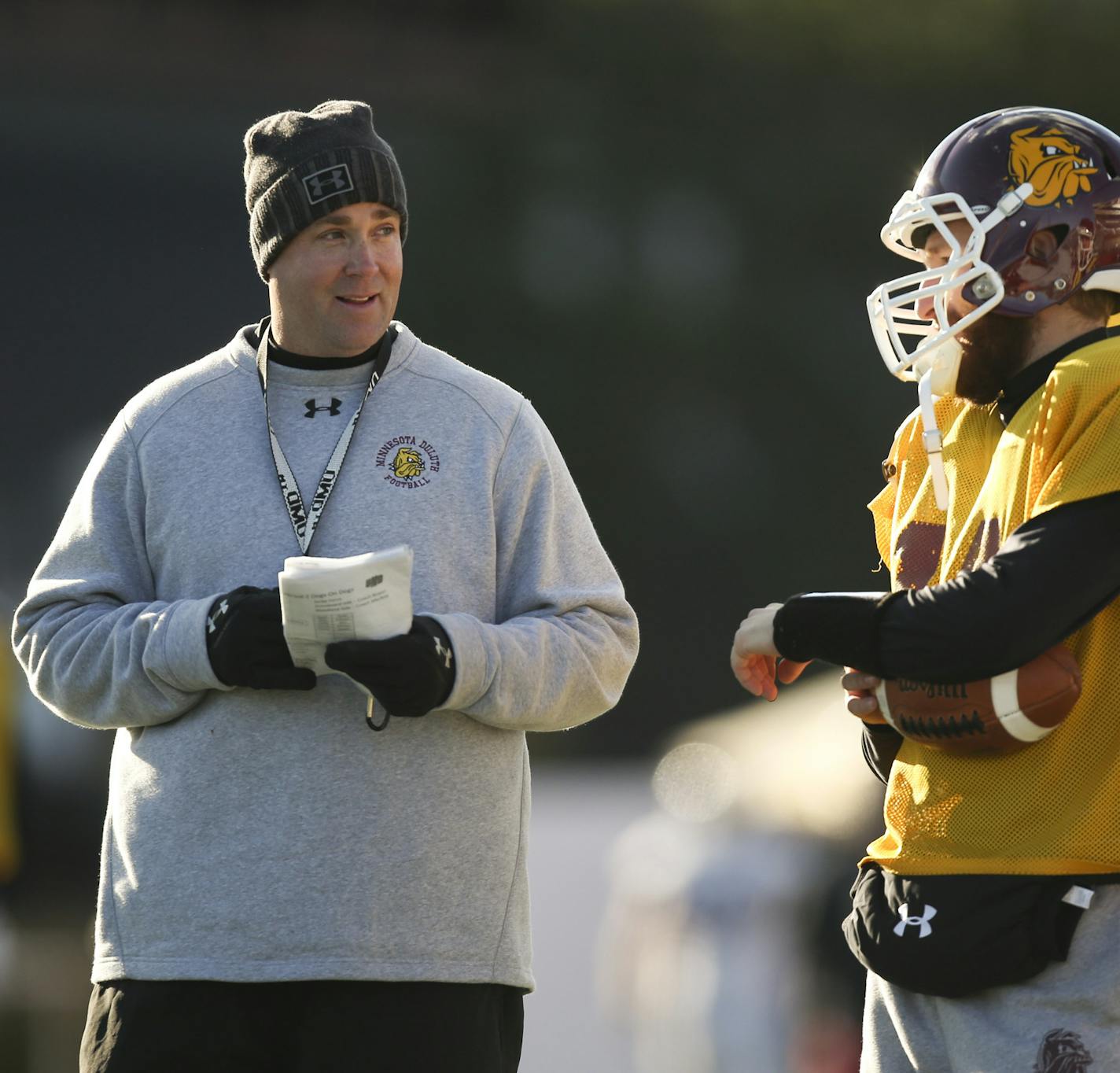 UMD head football coach Curt Wiese talked with quarterback Justin Laureys during practice last month. ] JEFF WHEELER &#x201a;&#xc4;&#xa2; jeff.wheeler@startribune.com The University of Minnesota Duluth football program is undefeated this season under head coach Curt Wiese. They were photographed at practice Wednesday afternoon, October 8, 2014 in Duluth.