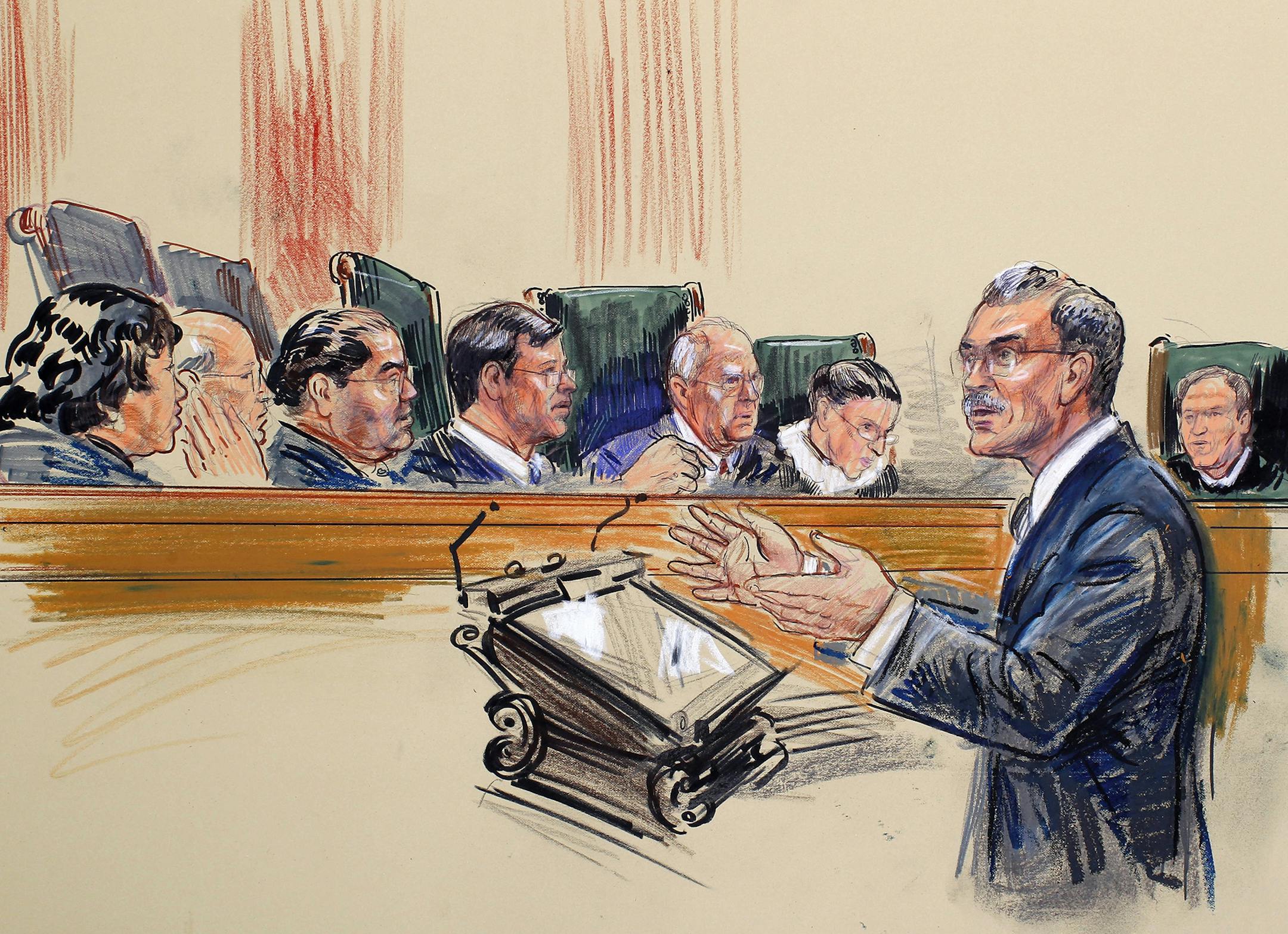 This artist rendering shows Solicitor General Donald Verrilli Jr. speaks before the Supreme Court in Washington, Wednesday, April 25, 2012, during the court's hearing on Arizona's "show me your papers" immigration law. Justice, seated, from left are, Sonia Sotomayor, Stephen Breyer, Antonin Scalia, Chief Justice John Roberts, Anthony Kennedy, Ruth Bader Ginsburg and Samuel Alito. (AP Photo/Dana Verkouteren) ORG XMIT: DCCD123
