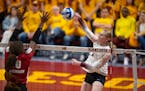Minnesota's McKenna Wucherer with a kill during the third game Sunday night, September 25, 2022 at the Maturi Pavilion in Minneapolis. The University 