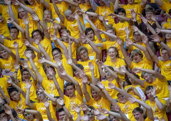New University students cheered before the Convocation, the official welcome ceremony for incoming freshmen, at Mariucci Arena, Thursday, August 29, 2