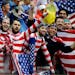 USA supporters cheer for their national team during the group G World Cup soccer match between the USA and Germany at the Arena Pernambuco in Recife, 