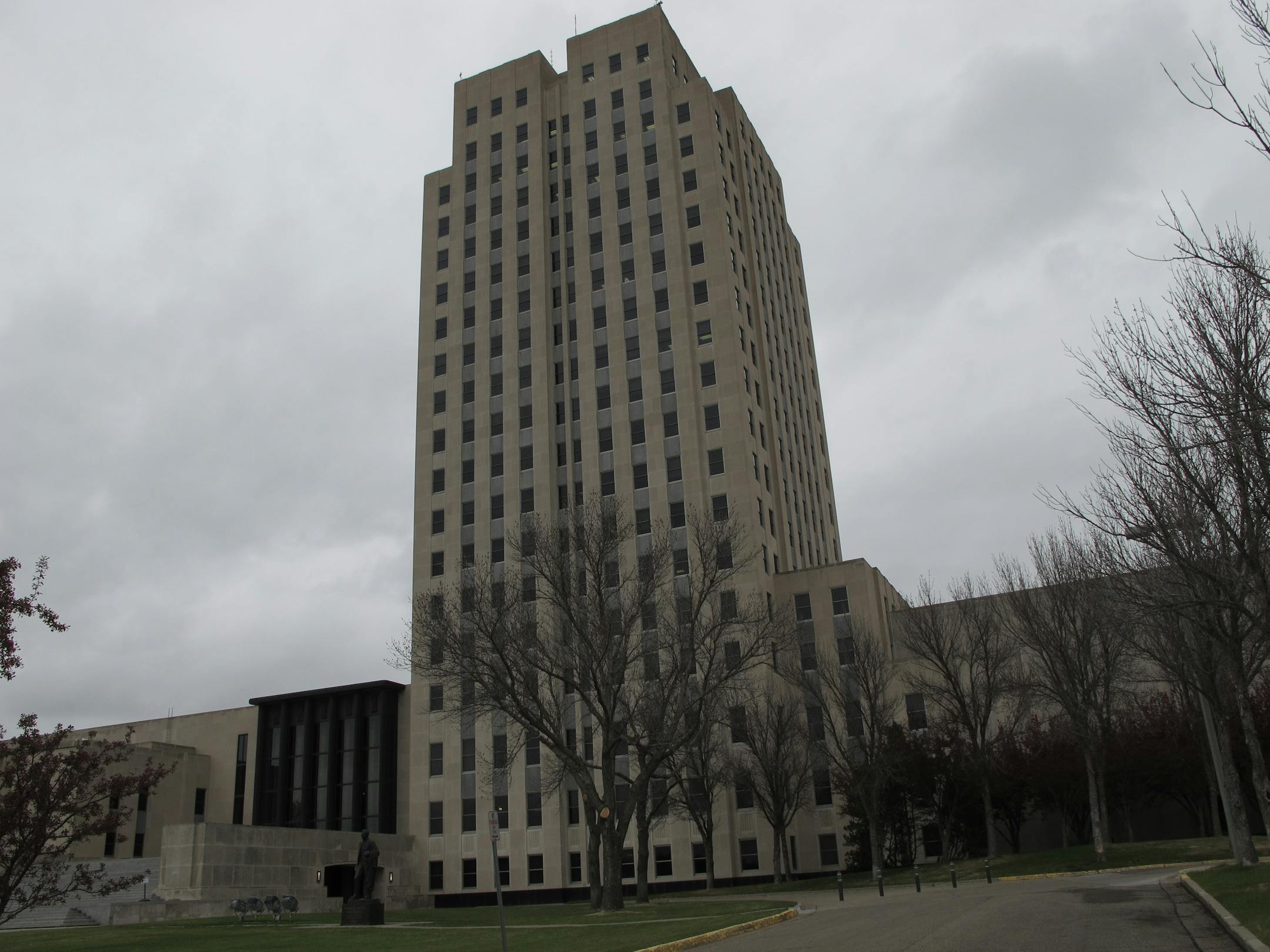 This photo, taken Thursday, April 19, 2012, shows the North Dakota Capitol, whose main tower is almost 250 feet high. The Republican majority leader of the Minnesota House on Thursday described the North Dakota Capitol building, which is located in Bismarck, N.D., as "embarrassing" and compared it to an insurance office. His remarks came during debate in the Minnesota Legislature in St. Paul, Minn., about whether to set aside money for repairs to the Minnesota Capitol. (AP Photo/Dale Wetzel)