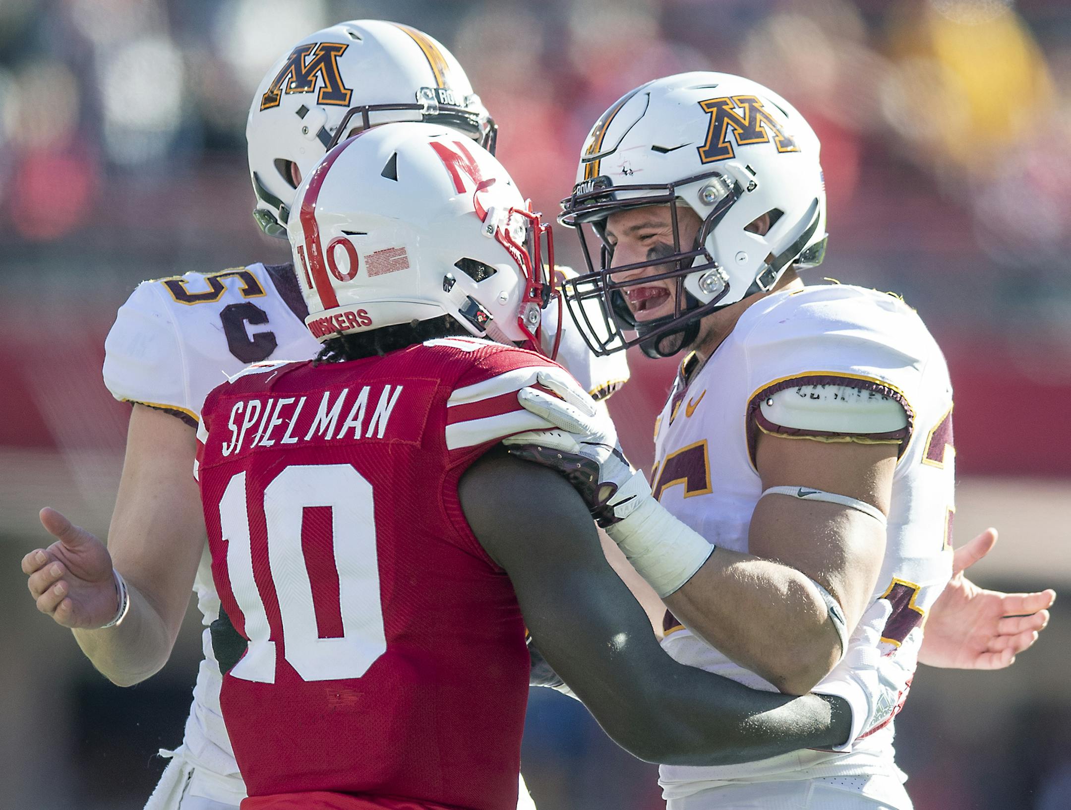 Minnesota's linebacker Blake Cashman greeted former Eden Prairie teammate Nebraska's wide receiver JD Spielman after a fair catch on a punt during the second quarter as Minnesota took on Nebraska at Memorial Stadium, Saturday, October 20, 2018 in Lincoln, NE. ] ELIZABETH FLORES ï liz.flores@startribune.com