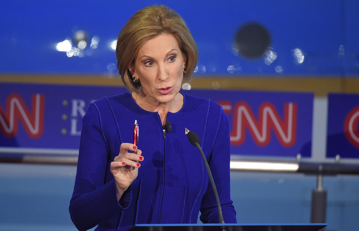 In this Spet. 16, 2015, photo, Republican presidential candidate, businesswoman Carly Fiorina makes a point during the CNN Republican presidential debate at the Ronald Reagan Presidential Library and Museum in Simi Valley, Calif. Fiorina&#xed;s first challenge in the Republican debate was simply getting a spot on the main stage. Now, after a standout performance, her next quest is to convert a burst of enthusiasm for her candidacy into actual support from voters and donors. Her success or failur