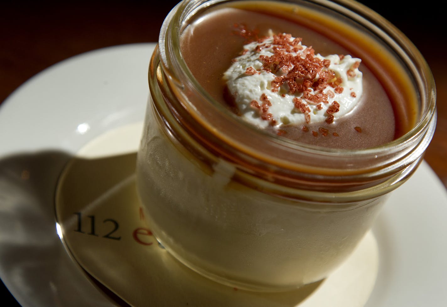 Nancy Silverton's butterscotch budino at the 112 Eatery in Minneapolis, Minn. ] CARLOS GONZALEZ cgonzalez@startribune.com, April 2, 2012 , Minneapolis, Minn, My top 5 late-night desserts. After a night of drinks, some people prefer greasy spoons. Others, like me, enjoy a little decadence after imbibing. No. 1 is 112 Eatery's Butterscotch Budino (shooting 2 desserts, tres leches, and budino pudding) AND Pot brownies at Amsterdam Bar & Hall in St. Paul