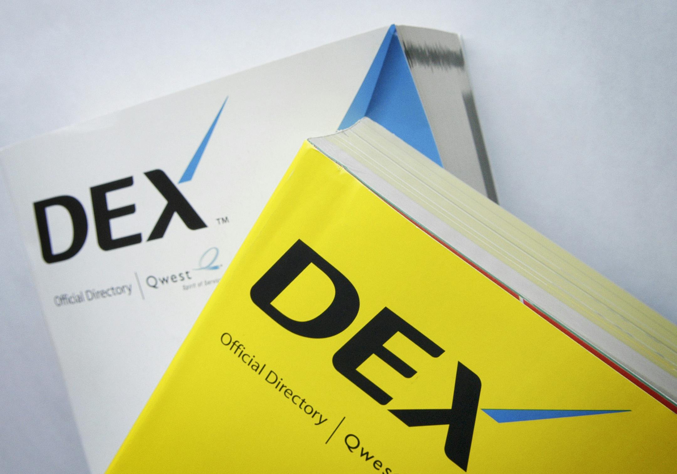 Photo by Glen Stubbe/ Star Tribune Thursday. May 5, 2005 -- Minneapolis, Minn. -- The new DEX telephone directories have been returned to one book for yellow pages and one for white, ending the experiment splitting them alphabetically instead. ORG XMIT: MIN2013091010384049