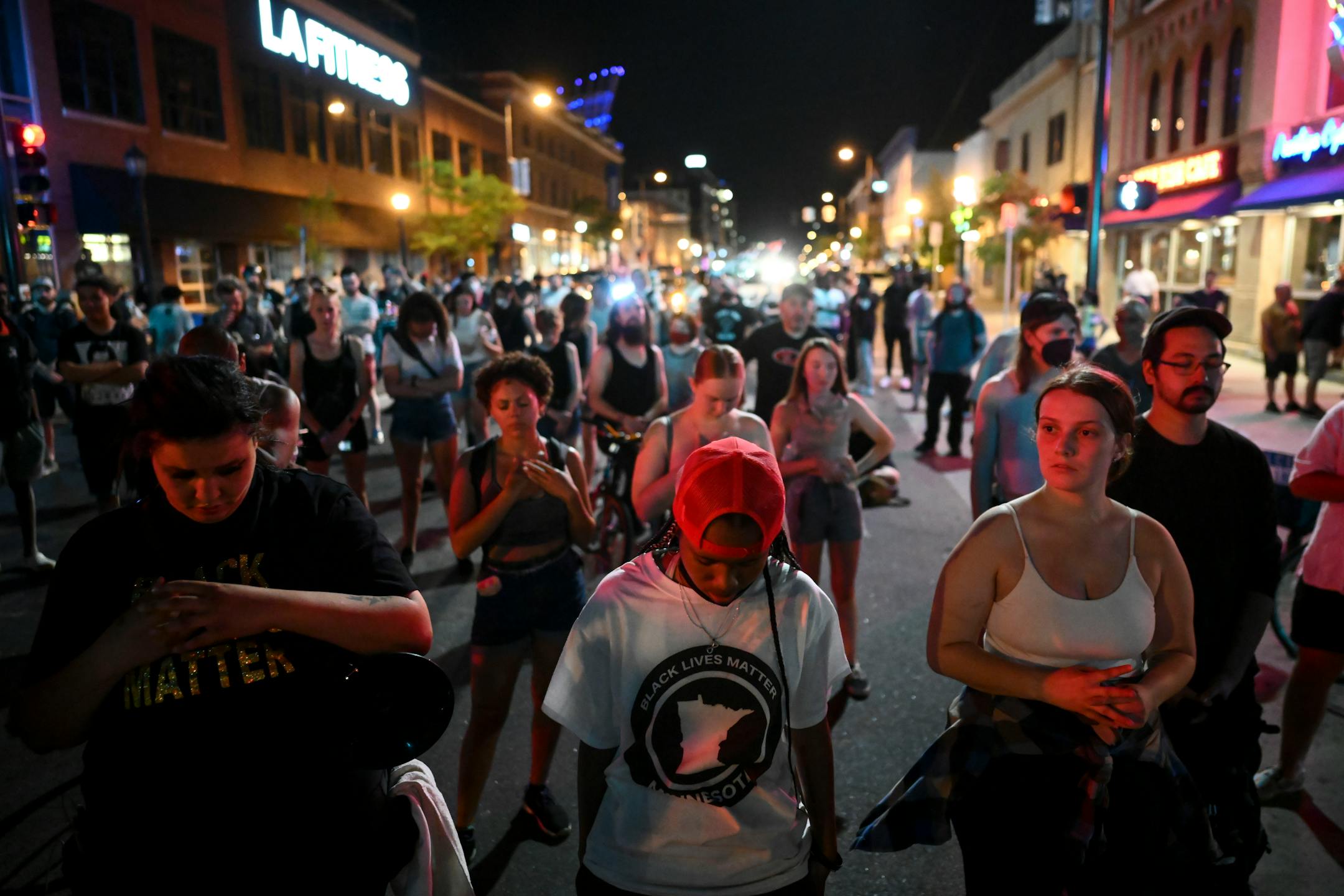 Protesters took a moment of silence to recognize victims of community gun violence, including the three children who were shot in the head in North Minneapolis.
