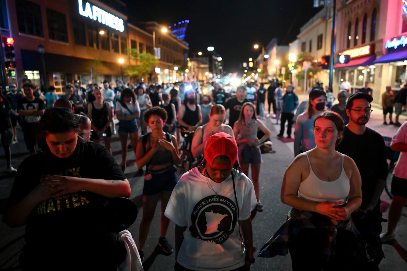 Protesters took a moment of silence to recognize victims of community gun violence, including the three children who were shot in the head in North Minneapolis.