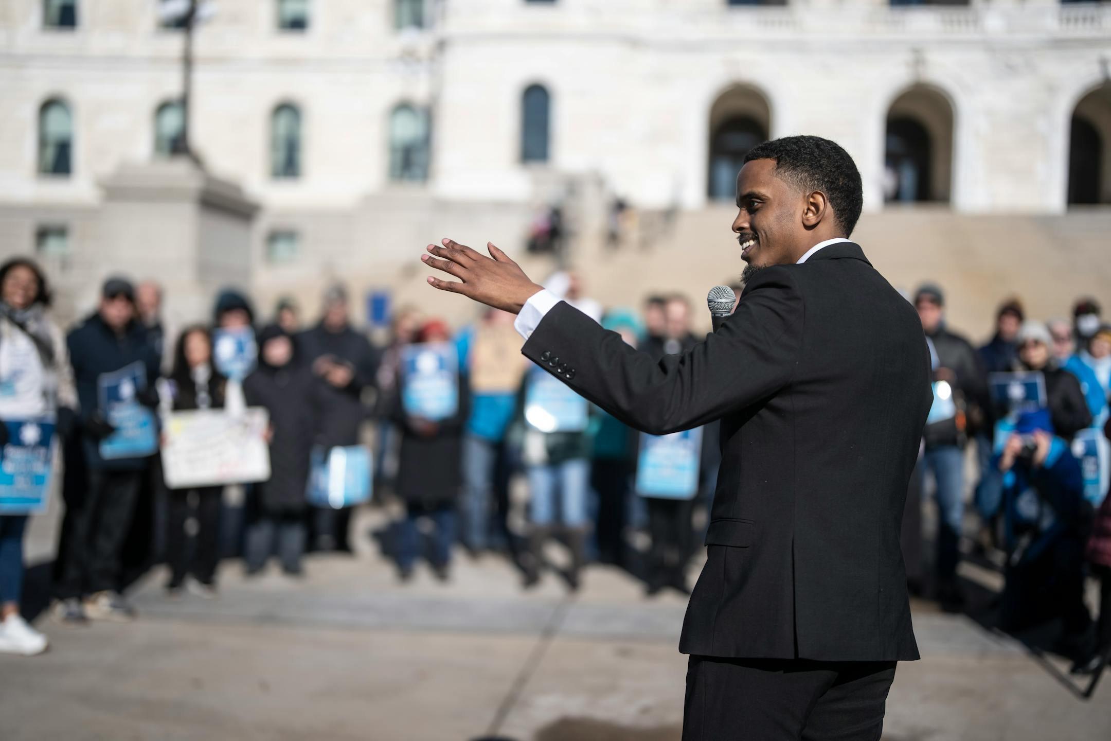 A crowd listened to Sen. Omar Fateh speak at Minnesota State Capitol on the first day of 2024 legislative session on February 12, 2024, in St. Paul.
