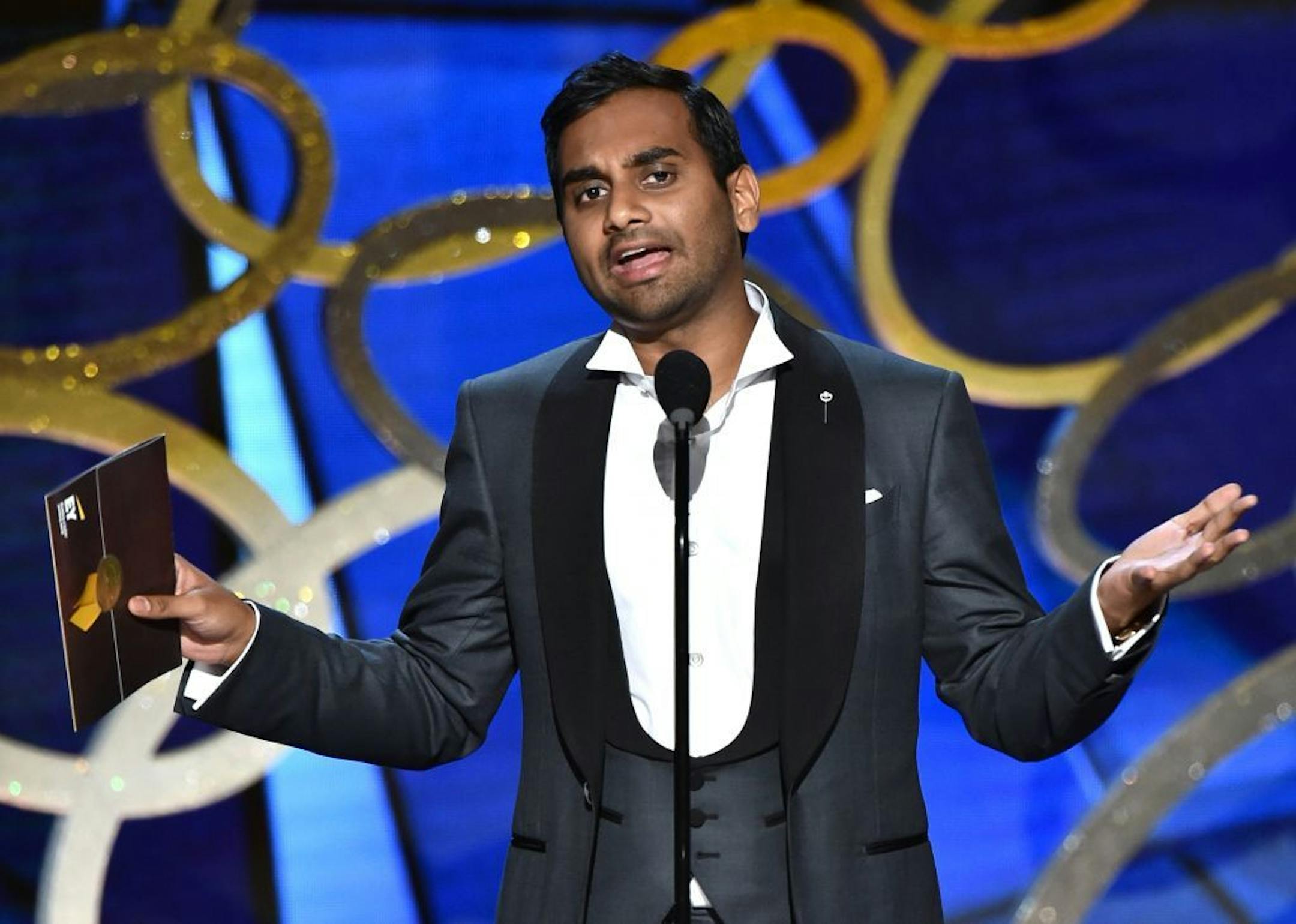 Aziz Ansari presents the award for outstanding writing for a variety series at the 68th Primetime Emmy Awards on Sunday, Sept. 18, 2016, at the Microsoft Theater in Los Angeles.