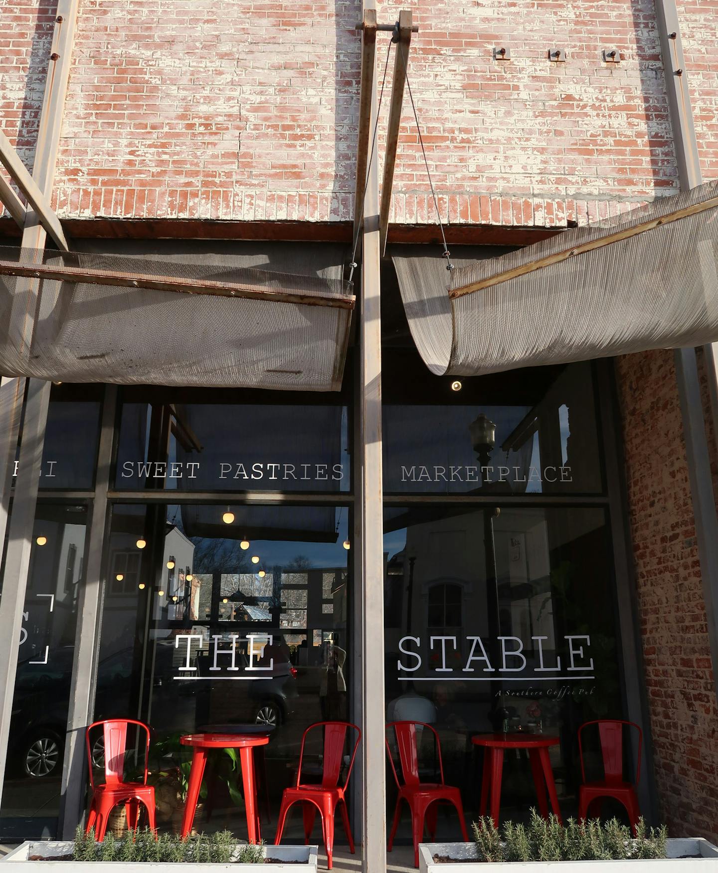 A sign of economic development in impoverished Hale County, The Stable is a coffee shop and cafe in the heart of Greensboro, Ala. The Rural Studio designed the renovation. Photo by Kerri Westenberg, Star Tribune