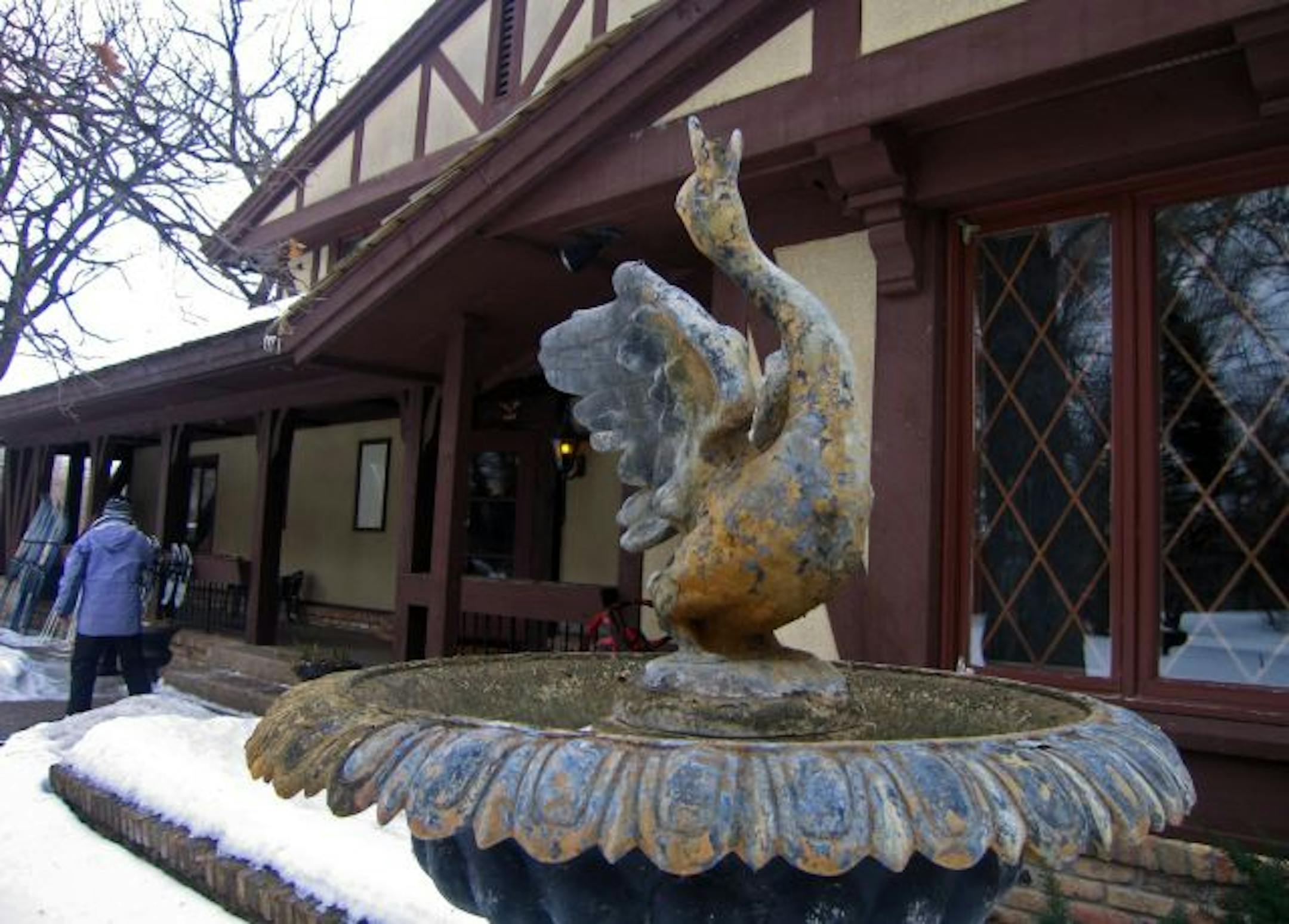 A ducky birdbath marks the entrance to the main lodge.