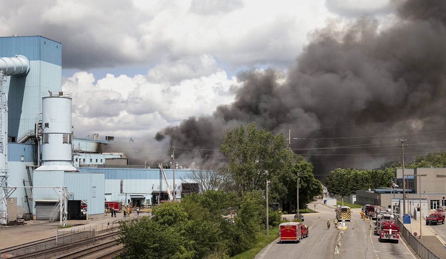 Debris and toxic smoke poured out from the Verso Paper Corp. Mill on Monday.