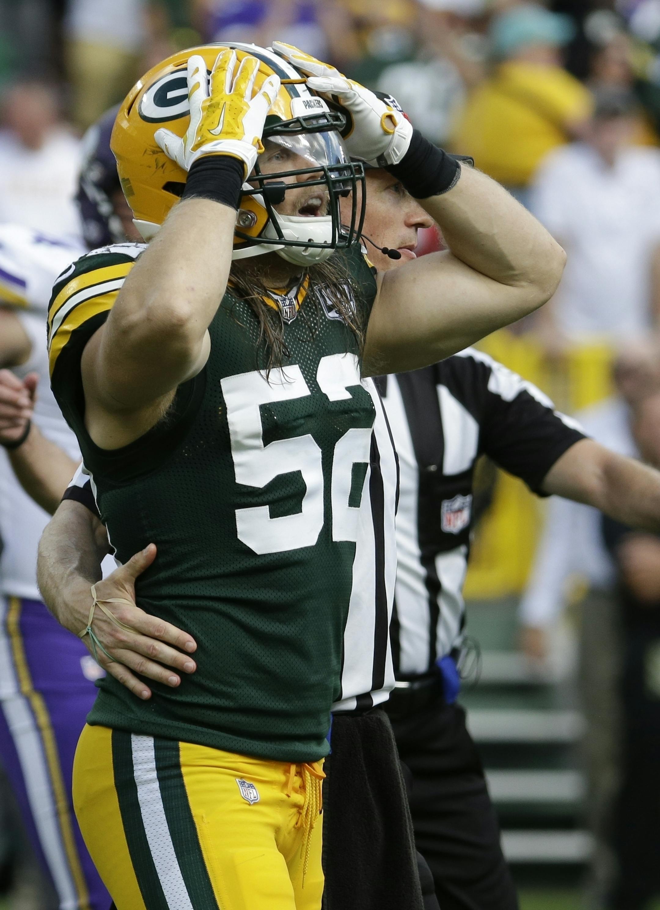 Green Bay Packers' Clay Matthews reacts after being called for a roughing the passer penalty during the second half of an NFL football game against the Minnesota Vikings Sunday, Sept. 16, 2018, in Green Bay, Wis. The game ended in a 29-29 tie. (AP Photo/Mike Roemer)