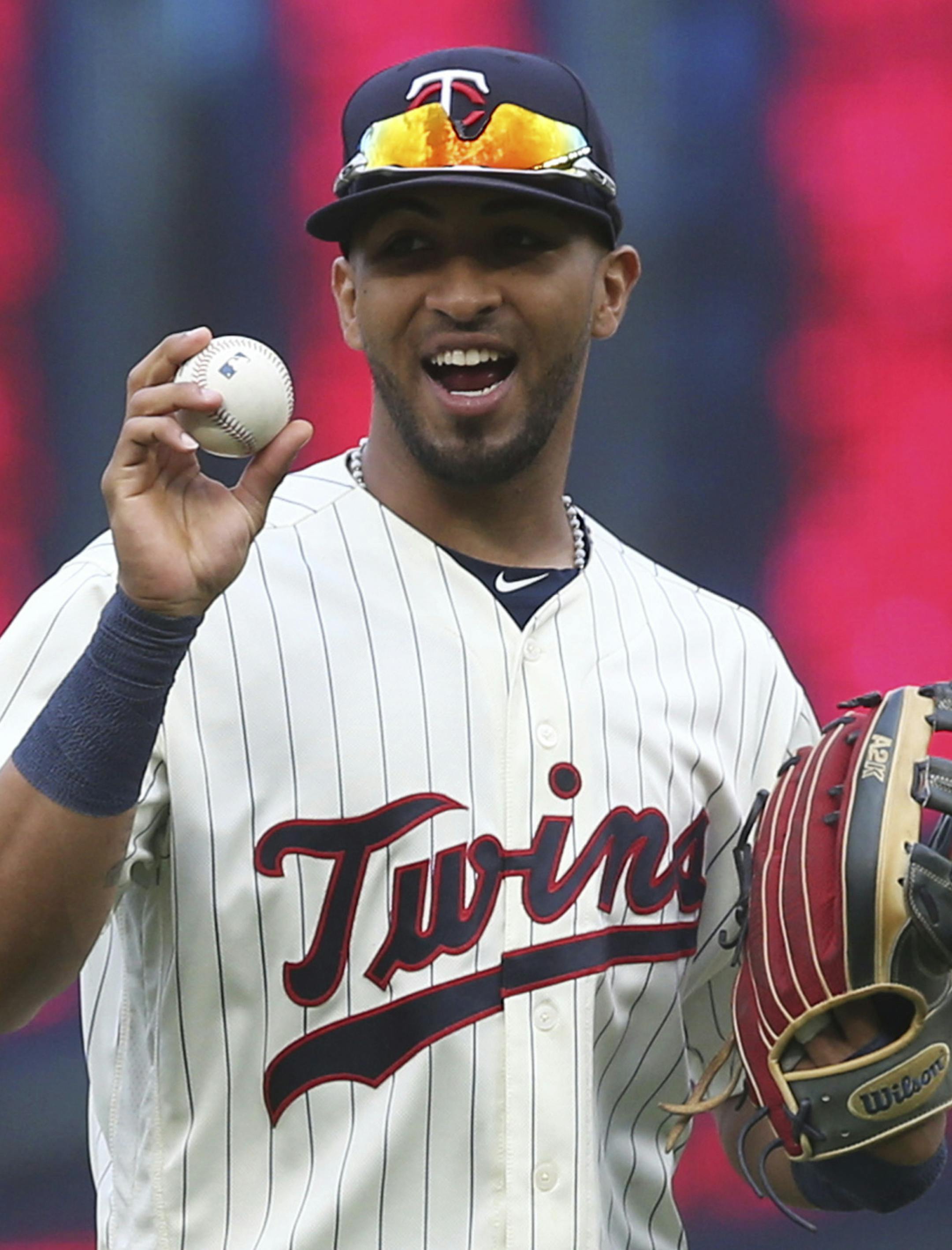Minnesota Twinsoutfielders Eddie Rosario, left, and Max Kepler celebrate after the Twins defeated the Cleveland Indians 7-1 in a baseball game Saturday, June 2, 2018, in Minneapolis. (AP Photo/Jim Mone)