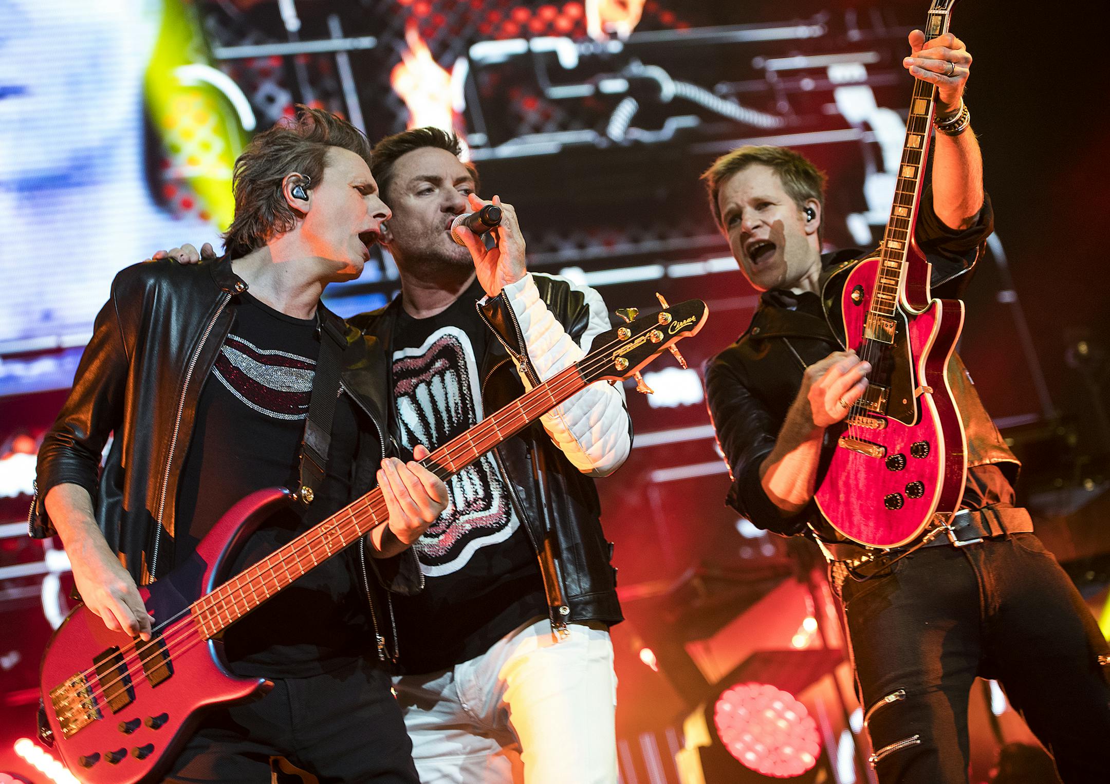 From left, John Taylor, Simon Le Bon and Dominic Brown performed with the rest of Duran Duran at the Xcel Energy Center on Saturday night. ] Isaac Hale &#xef; isaac.hale@startribune.com Duran Duran and Chic, featuring Nile Rodgers, performed at the Xcel Energy Center in St. Paul, MN, on Saturday, July 23, 2016.
