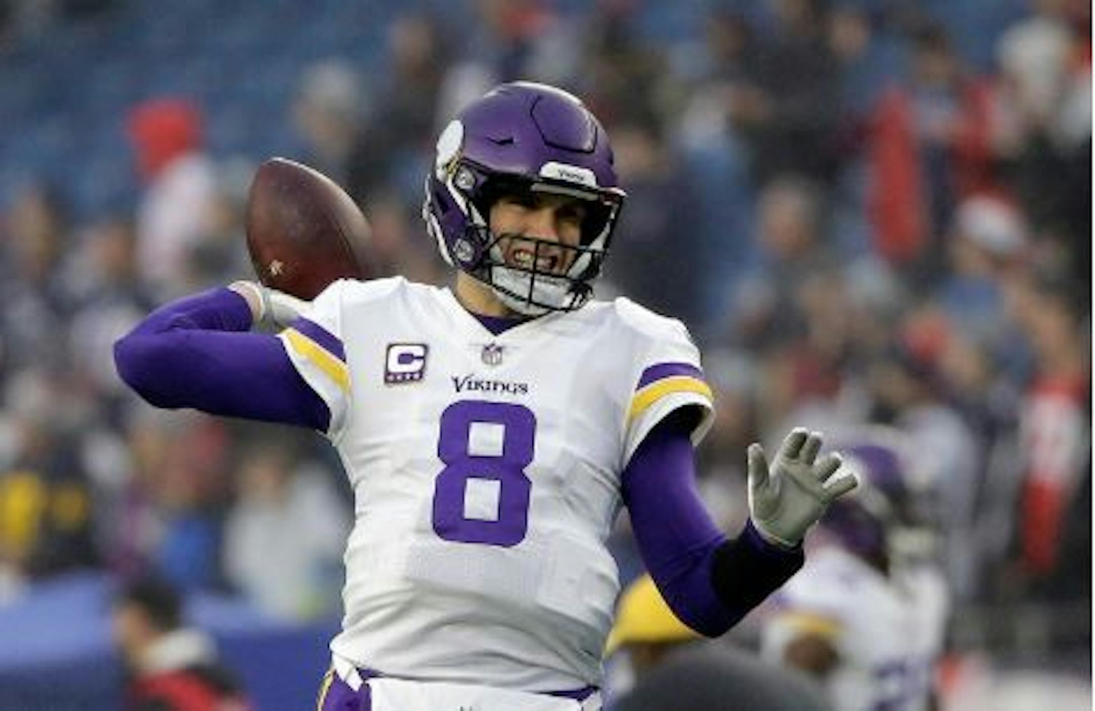 Vikings quarterback Kirk Cousins, seen tossing around the football during pregame on Sunday at New England.