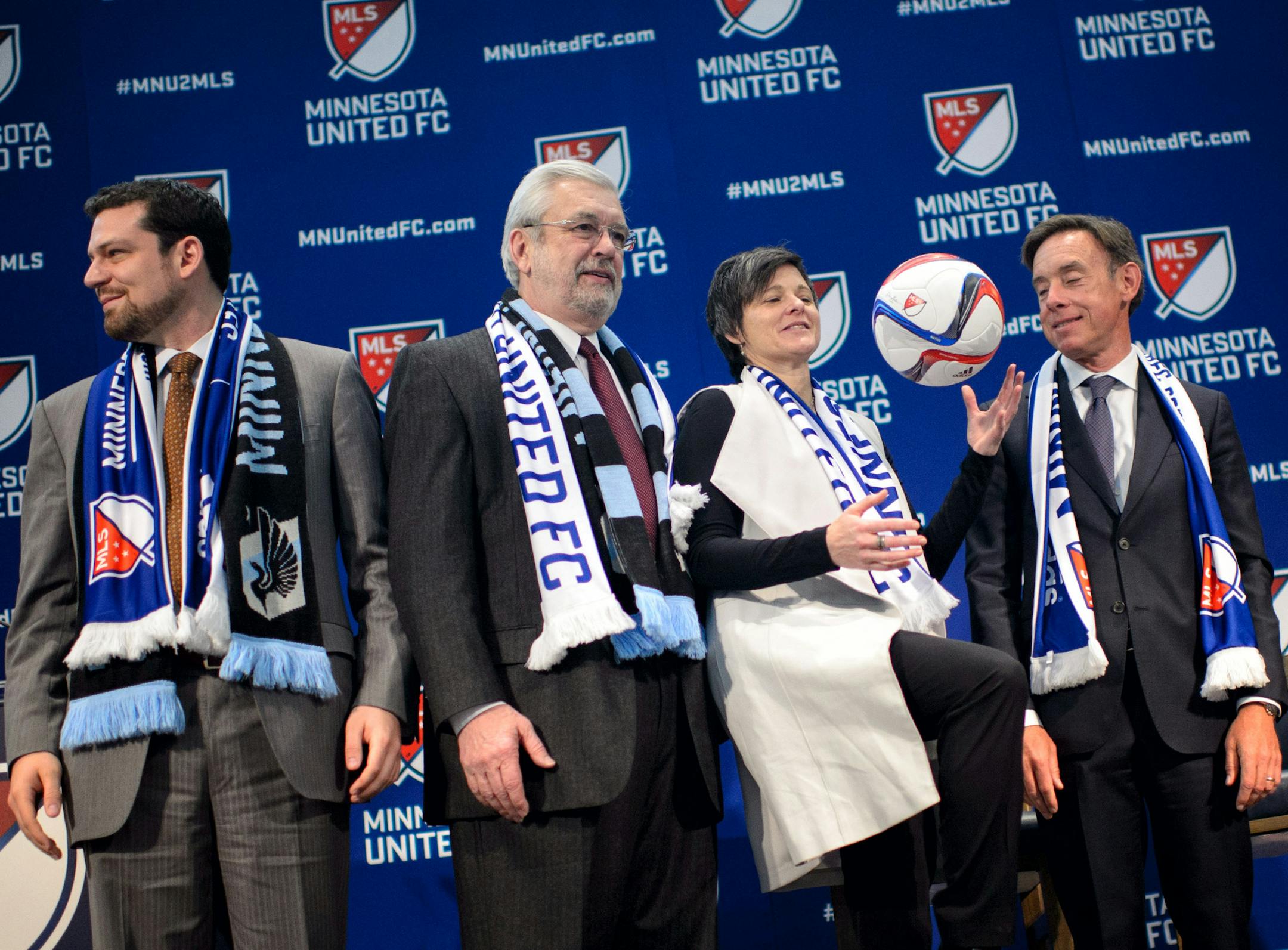 Nick Rogers, President of Minnesota United FC, Dr. Bill McGuire, Wendy Carlson Nelson and Robert Pohlad. Wendy kicked the ball with her knee on stage. ] GLEN STUBBE * gstubbe@startribune.com Wednesday, March 25, 2015 Major League Soccer, Commissioner Don Garber and Dr. Bill McGuire announced that Minnesota will be awarded an expansion soccer team.