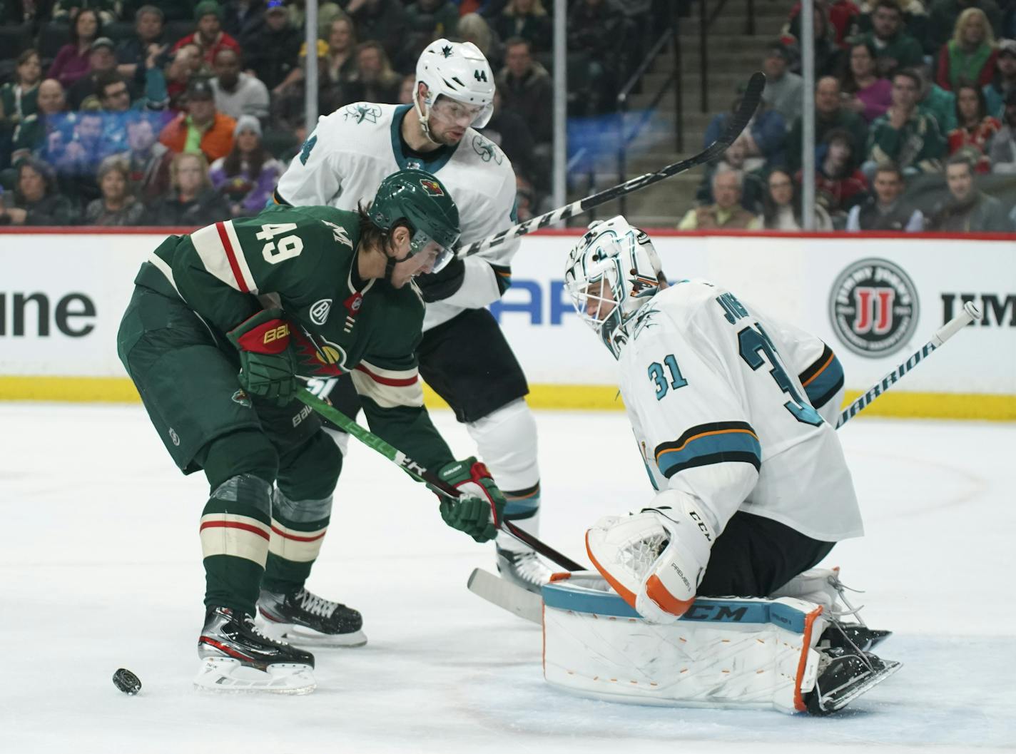 Not knowing the puck was behind, him, Minnesota Wild center Victor Rask (49) dug into the pads of San Jose Sharks goaltender Martin Jones (31) in the first period while San Jose Sharks defenseman Marc-Edouard Vlasic (44) looked on. ] JEFF WHEELER &#x2022; jeff.wheeler@startribune.com The Minnesota Wild faced the San Jose Sharks in an NHL hockey game Monday night, March 11, 2019 at Xcel Energy Center in St. Paul.