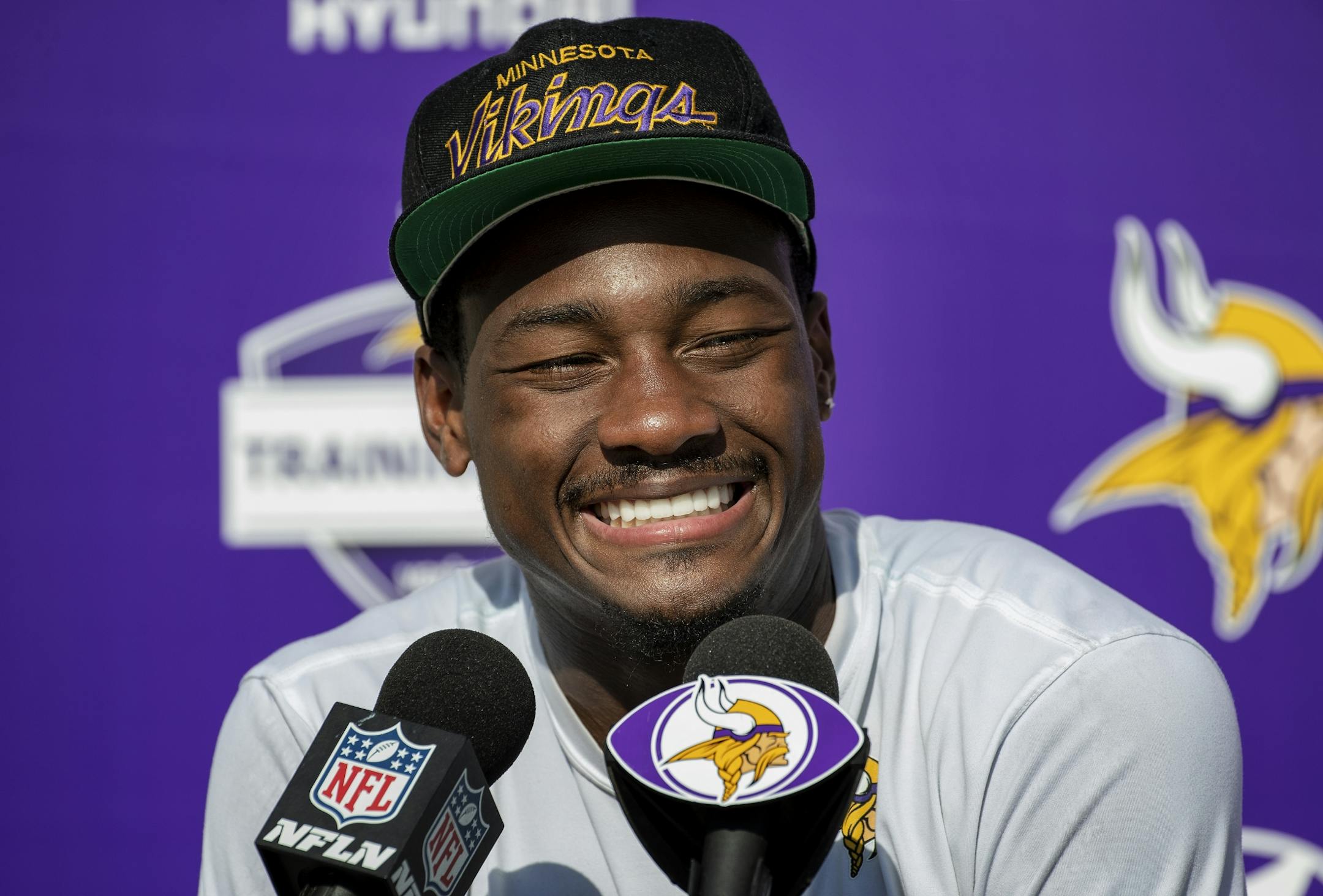Minnesota Vikings receiver Stefon Diggs (14) smiled during a press conference after practice on Tuesday. Diggs signed a 5-year extension with the team.