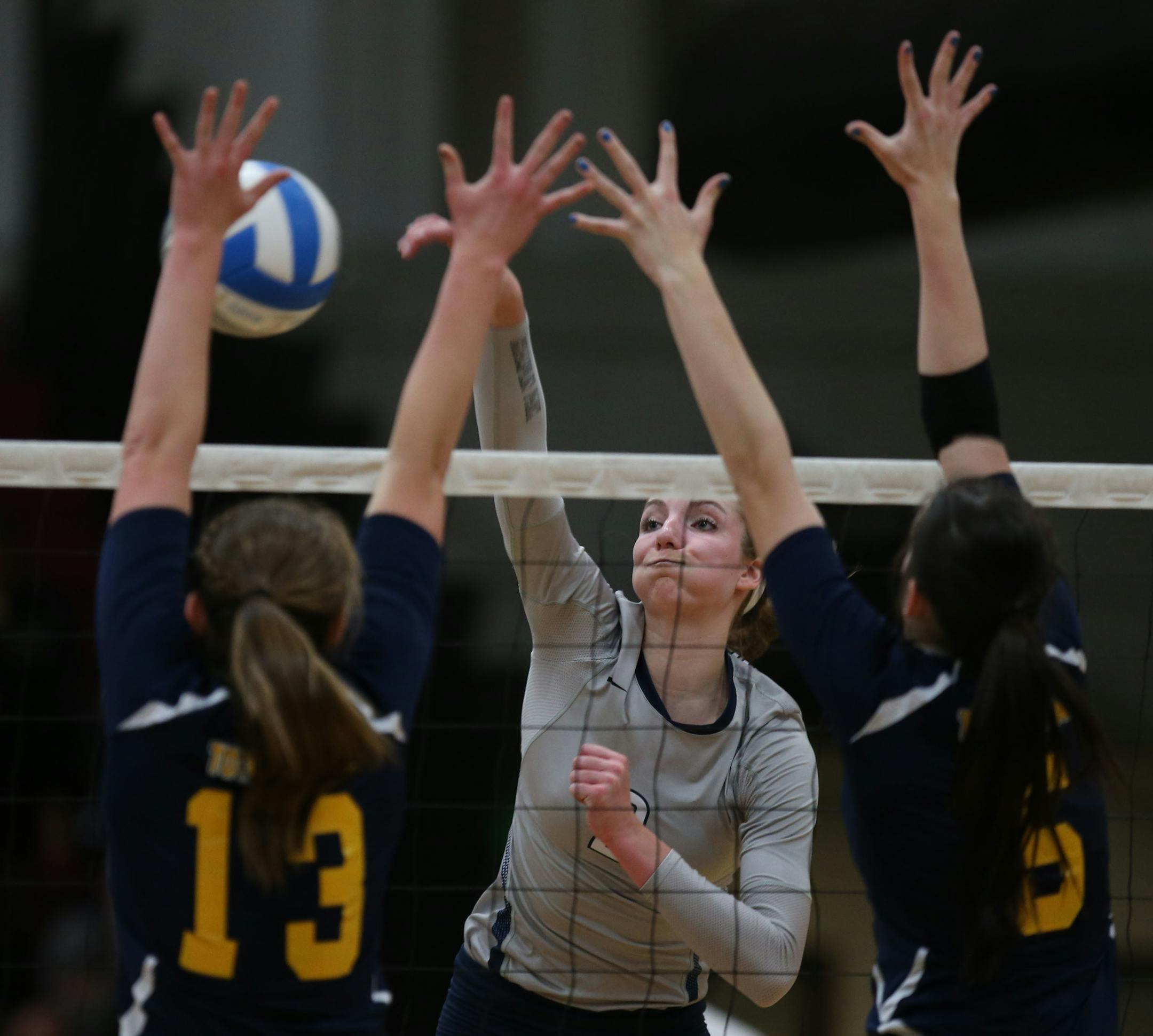 Champlin Park's Sydney Hilley, center, has a scholarship from Wisconsin and is one of eight Division I volleyball players coming out of Minnesota. And that number could be growing.