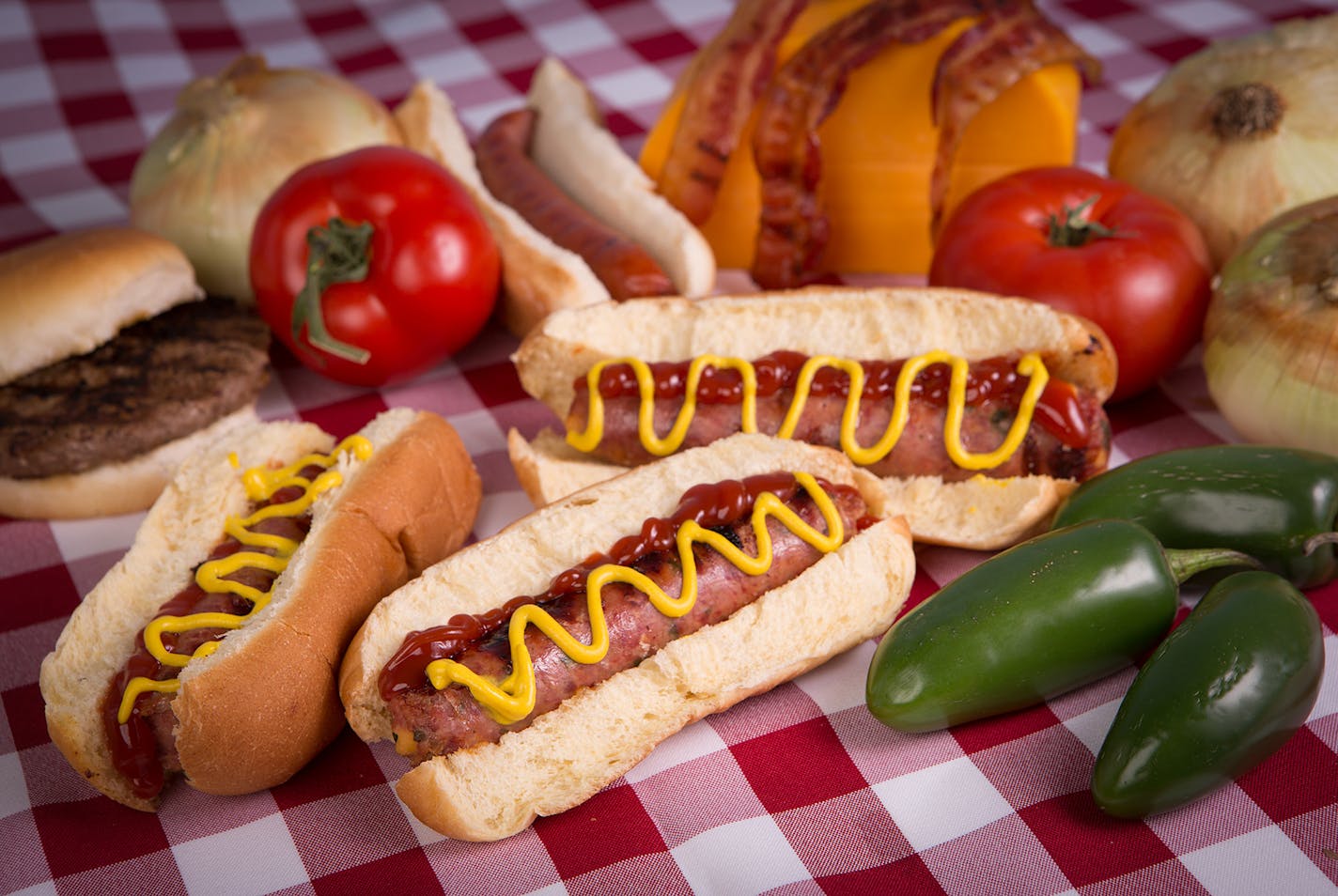 Burger Dog: A ground blend of hamburger, hot dog, bacon, cheese and a splash of jalapeño on a hot dog bun. Find it at Gass Station Grill located on the southeast outside corner of the Food Building off Cooper Street at the Minnesota State Fair.