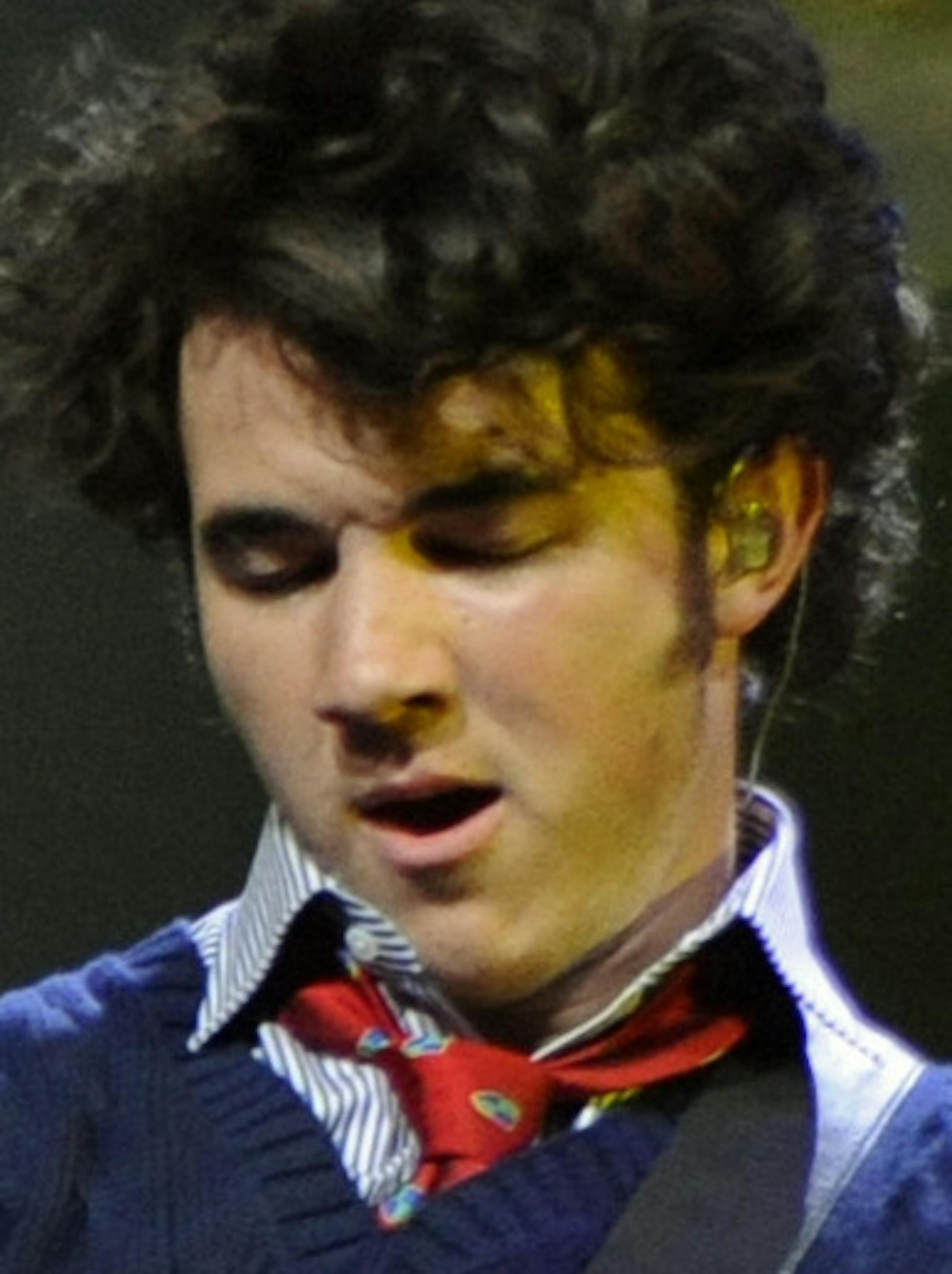 The Jonas Brothers, Nick, left, Joe, and Kevin, right, perform during Z100's Zootopia '08 concert Saturday night, May 17, 2008 at Izod Center in East Rutherford, N.J. (AP Photo/Bill Kostroun) ORG XMIT: MIN2013070812575439