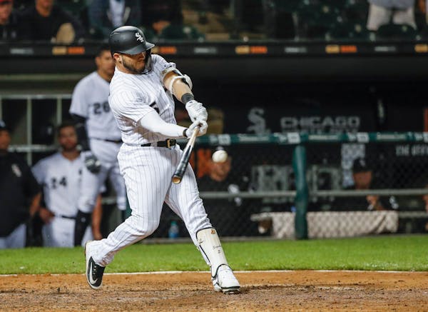 Chicago White Sox's Yolmer Sanchez hit a two-run single off the Twins' Taylor Rogers during the sixth inning