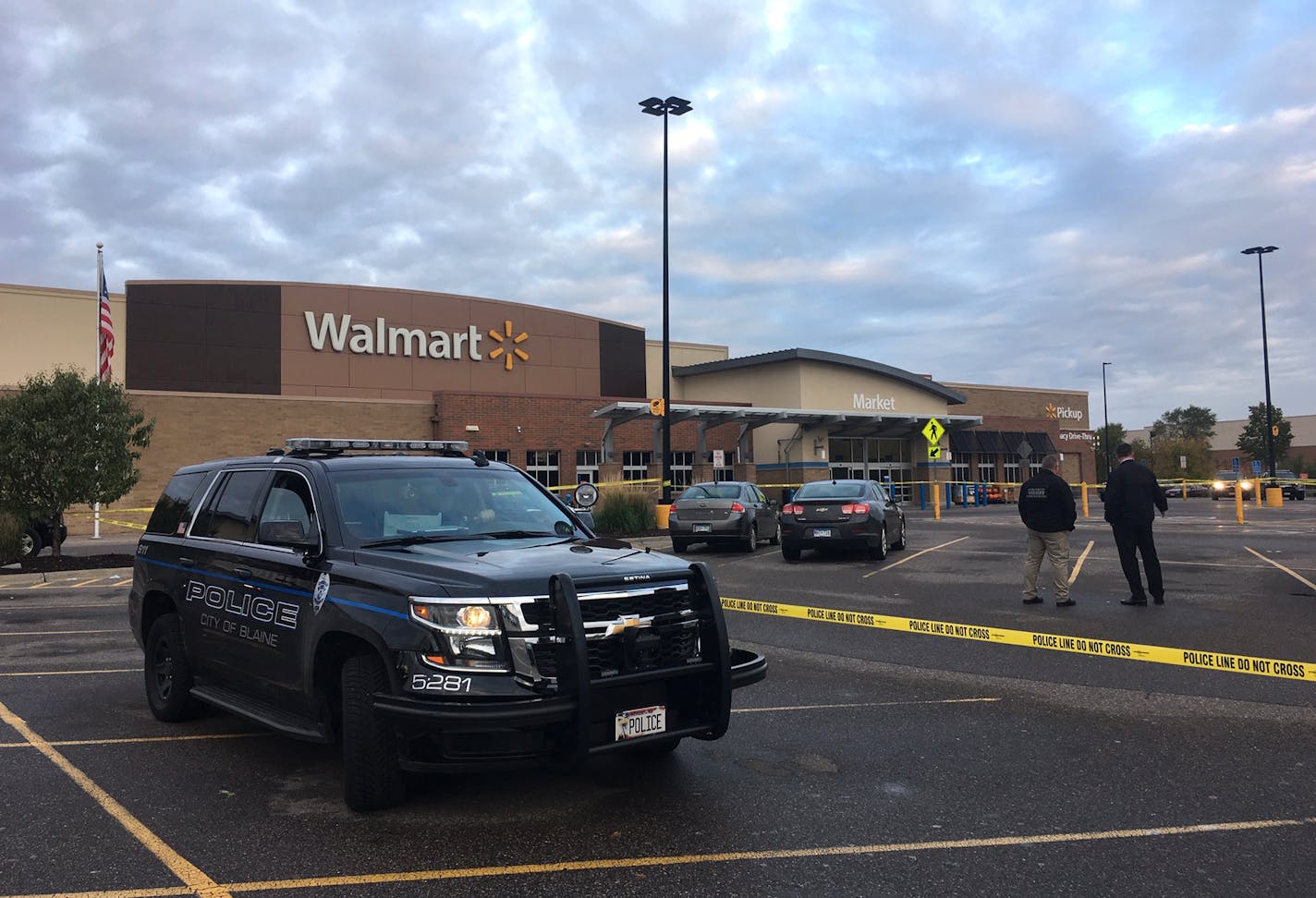 Authorities investigate the scene at a Walmart in Blaine. At least one person was injured in a shooting Monday morning at the Walmart.