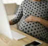 Pregnant woman working from home office ORG XMIT: 636306945