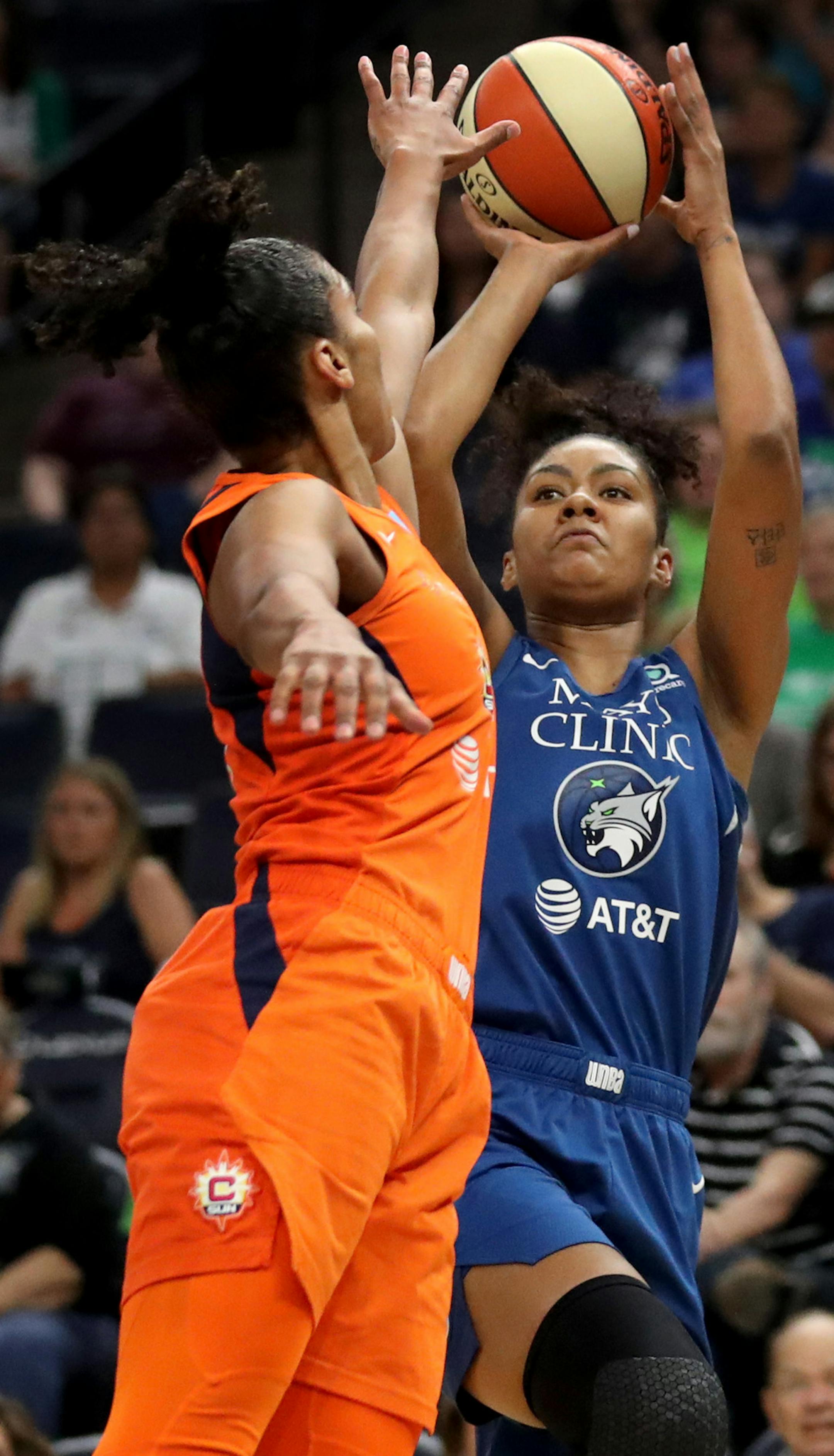 The Minnesota Lynx's Damiris Dantas (92) hits a three point shot over the Connecticut Sun's Alyssa Thomas (25) during the first quarter Friday, Aug. 9, 2019, at Target Center in Minneapolis, MN.] DAVID JOLES &#x2022; david.joles@startribune.com Connecticut at Lynx