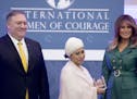 Razia Sultana of Bangladesh poses with Secretary of State Mike Pompeo and first lady Melania Trump as she is awarded the 2019 International Women of C