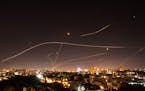 Israel's Iron Dome missile defense system firing to intercept rockets launched at Tel Aviv from Gaza Strip on May 16, 2021. In Gaza Strip, there is ne
