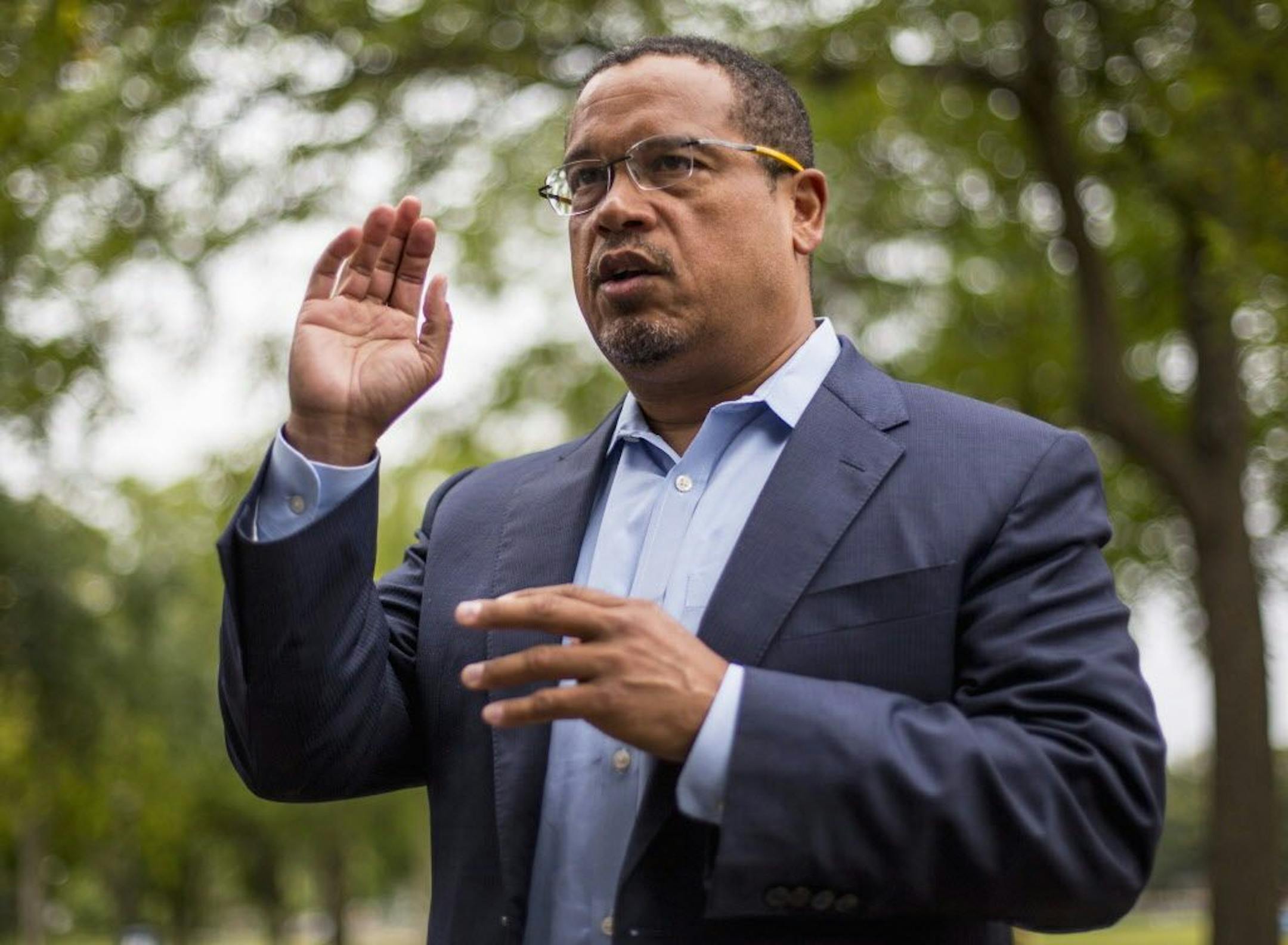FILE - In this Aug. 17, 2017, file photo, U.S. Rep. Keith Ellison addresses campaign volunteers and supporters in Minneapolis.