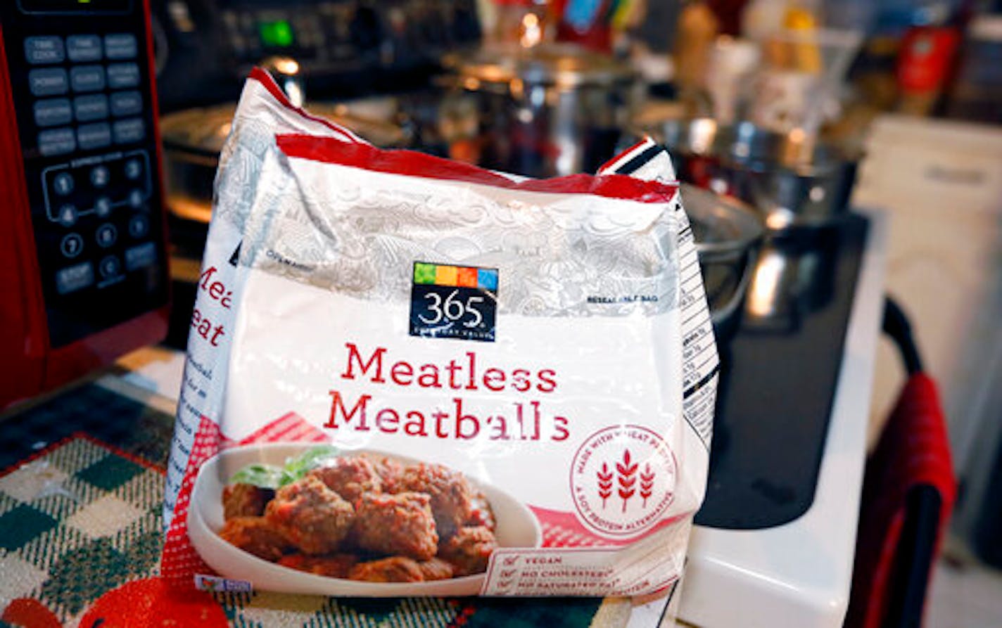 A federal lawsuit says Mississippi is violating free-speech rights by banning makers of plant-based foods from using terms such as "meatless meatballs," "vegan bacon," "beefless burger" or "beefless tips," as displayed in a Jackson, Miss., home, Tuesday, July 2, 2019. The lawsuit was filed Monday by the Plant Based Foods Association and the Illinois-based Upton's Naturals Co., which makes vegan products and sells them in many states, including Mississippi. It was filed the same day Mississippi e