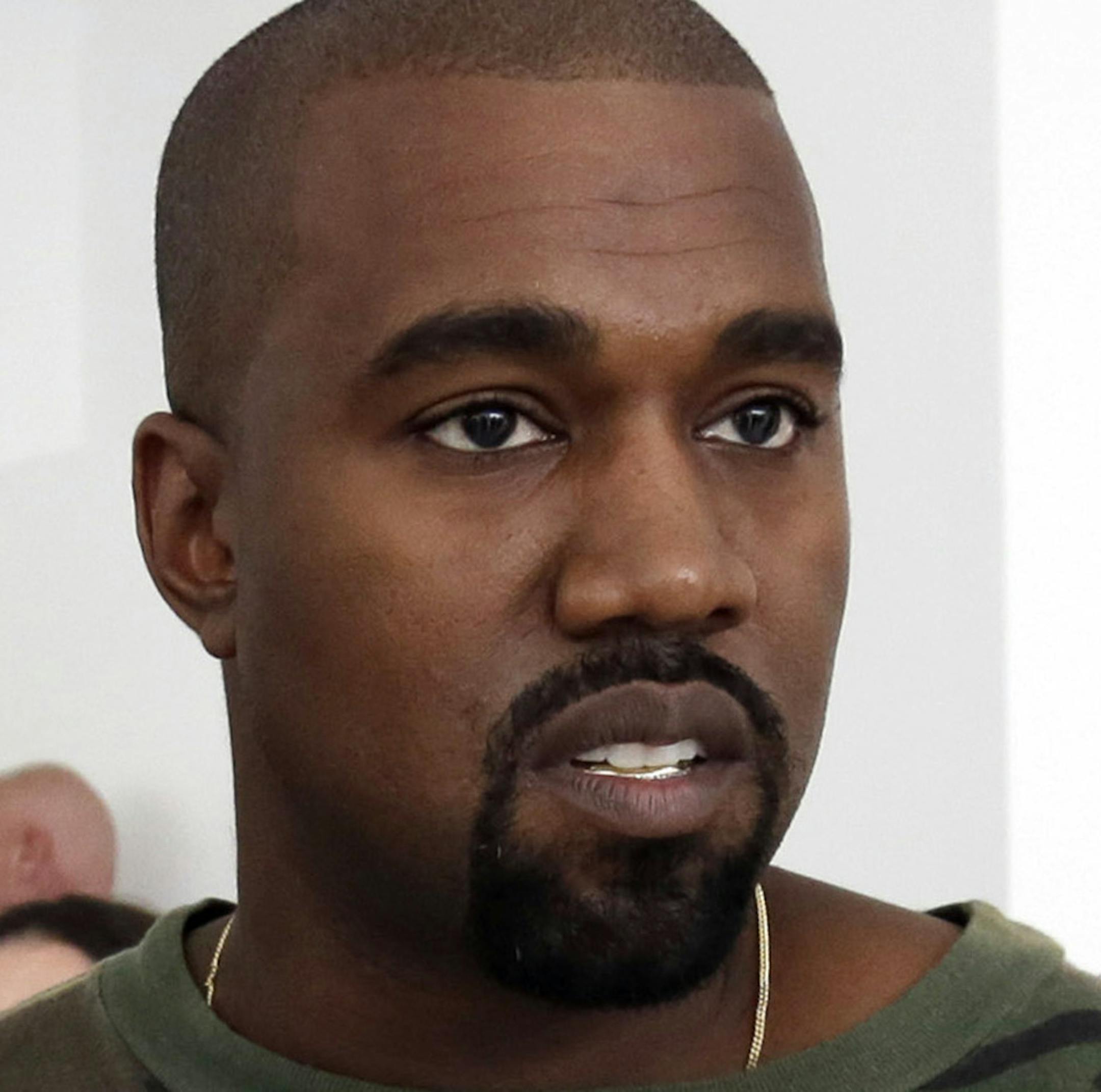FILE - In this Sept. 10, 2015 file photo, Kanye West appears at the Brother Vellies Spring 2016 collection presentation during Fashion Week, in New York. West has unveiled a video that is all about a subject he knows something about: fame. The video for a single titled ìFamousî unveiled Friday, June 24, 2016, at a promotional event in the Los Angeles Forum _ features what appears to be a naked West with images of 11 other famous people, some of whom he has had good and bad relationship