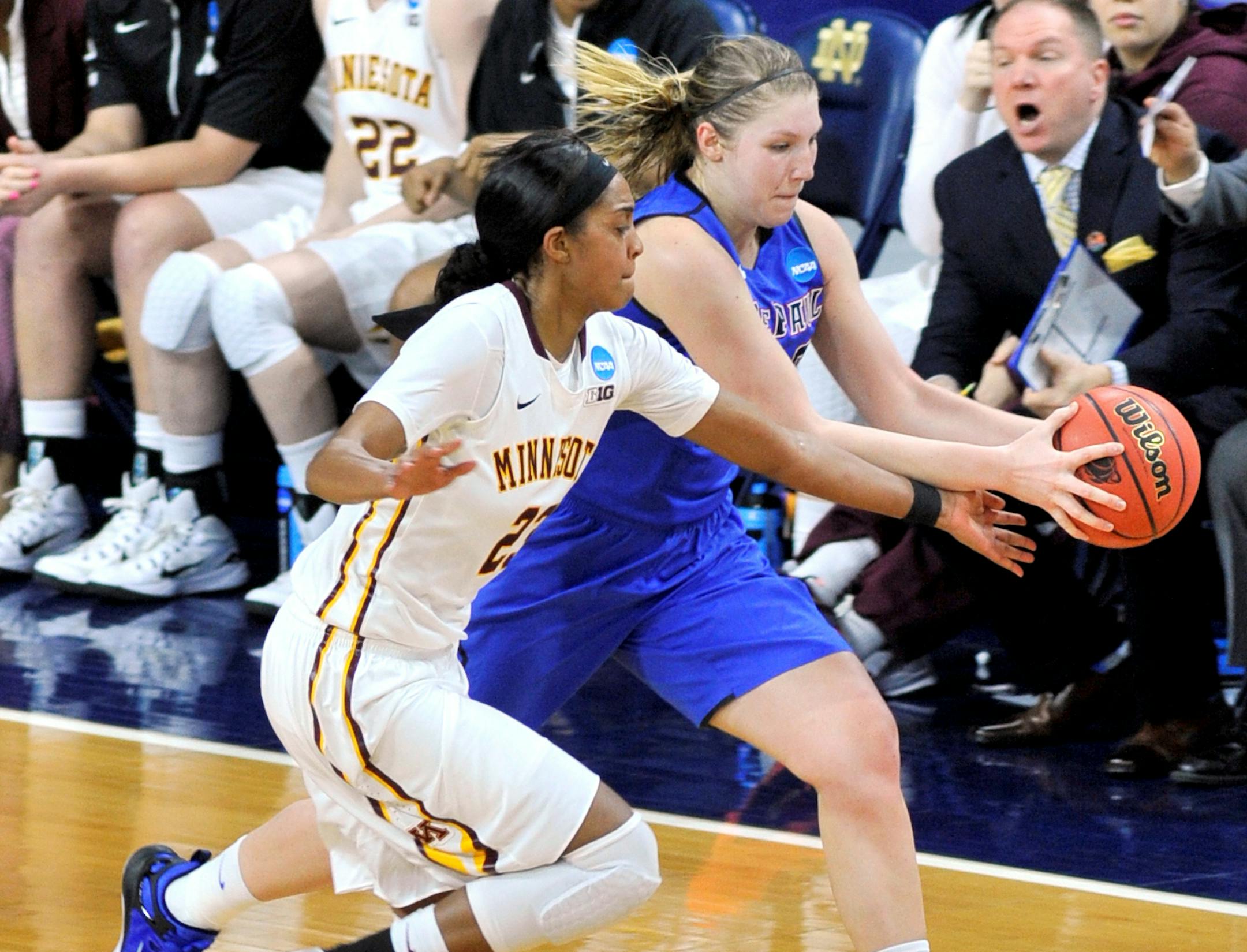 DePaul forward Megan Podkowa (30) heads upcourt as Minnesota guard Shae Kelly (23) fouls in the second half of a women's college basketball game in the first round of the NCAA tournament in South Bend, Ind., Friday, March 20, 2015. DePaul won 79-72. (AP Photo/Joe Raymond)