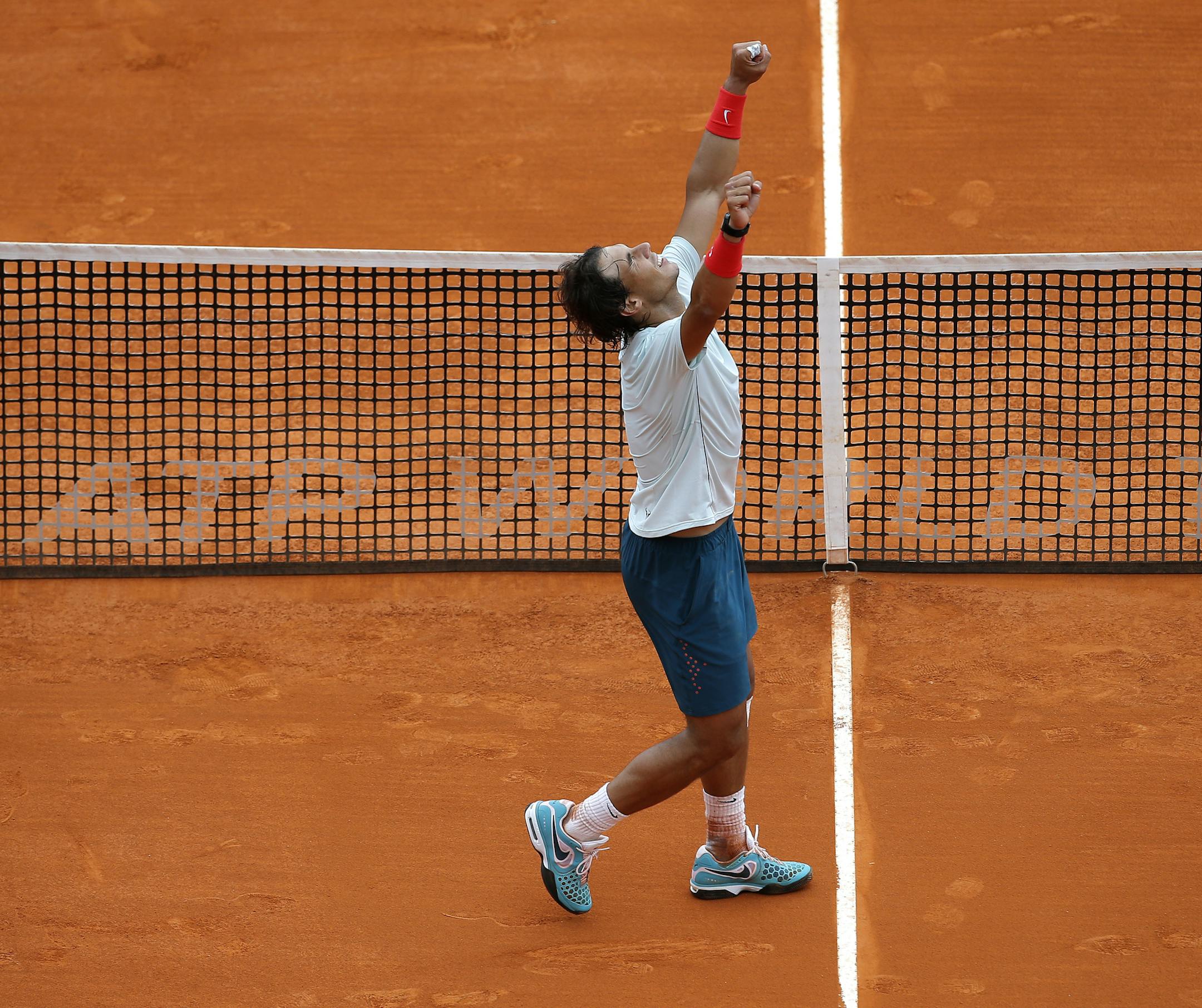 Spain's Rafael Nadal reacts after defeating France's Jo-Wilfried Tsonga in their semifinal match of the Monte Carlo Tennis Masters tournament in Monaco, Saturday, April 20, 2013. (AP Photo/Lionel Cironneau)