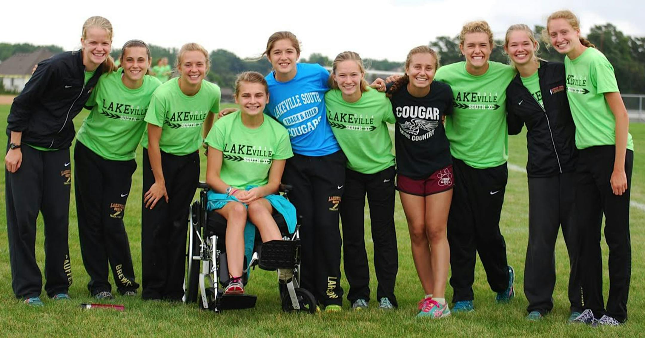 Hannah Moland in her wheelchair with her teammates last year. Photo courtesy of Lucinda Moland