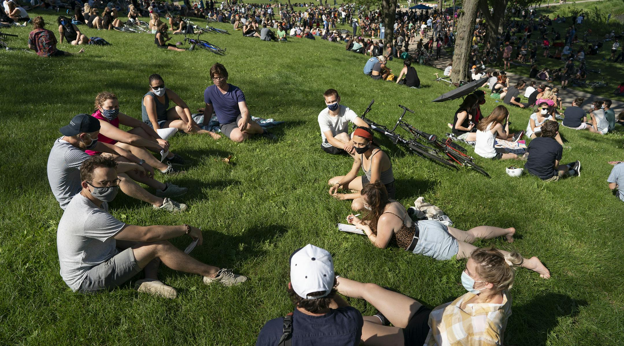 Community members at gathered at "The Path Forward" meeting at Powerhorn Park, a meeting between Minneapolis City Council and community members.] Jerry Holt •Jerry.Holt@startribune.com "The Path Forward," a meeting between the community and Minneapolis City Council members was held Powderhorn Park Sunday June 7, 2020 in Minneapolis,MN. The focused of the meeting was to defund the Minneapolis Police Department..