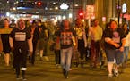 Between 50 and 100 protestors against police brutality march in downtown Minneapolis, Wednesday night, May 13, 2015. The police chief in Minneapolis h