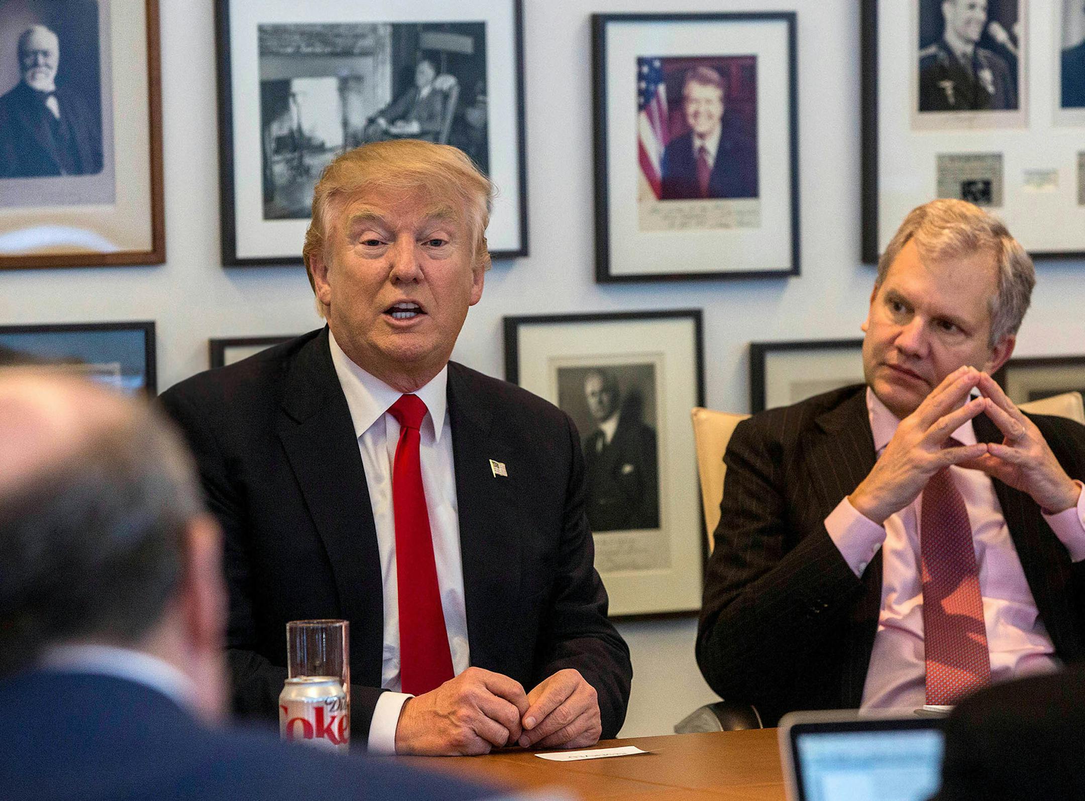 President-elect Donald Trump, left, and former New York Times Publisher Arthur Sulzberger Jr., appear during a meeting with editors and reporters at The New York Times building, Nov. 22, 2016. A.G. Sulzberger succeeded his father on Jan. 1.