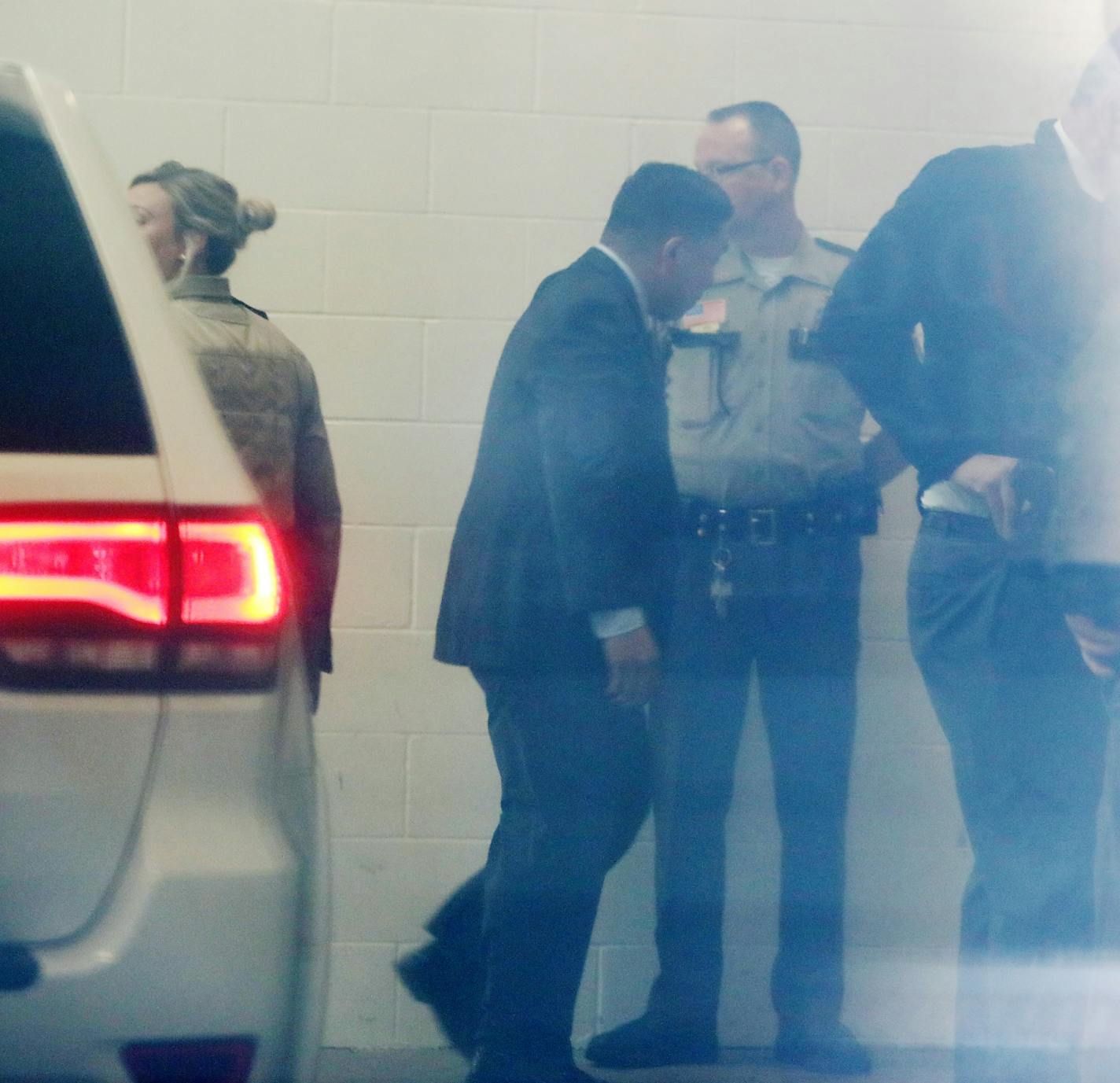 St. Anthony police Officer Jeronimo Yanez arrives in a vehicle through a side car port to the Ramsey County Courthourse Tuesday, April 4, 2017, in St. Paul, MN.