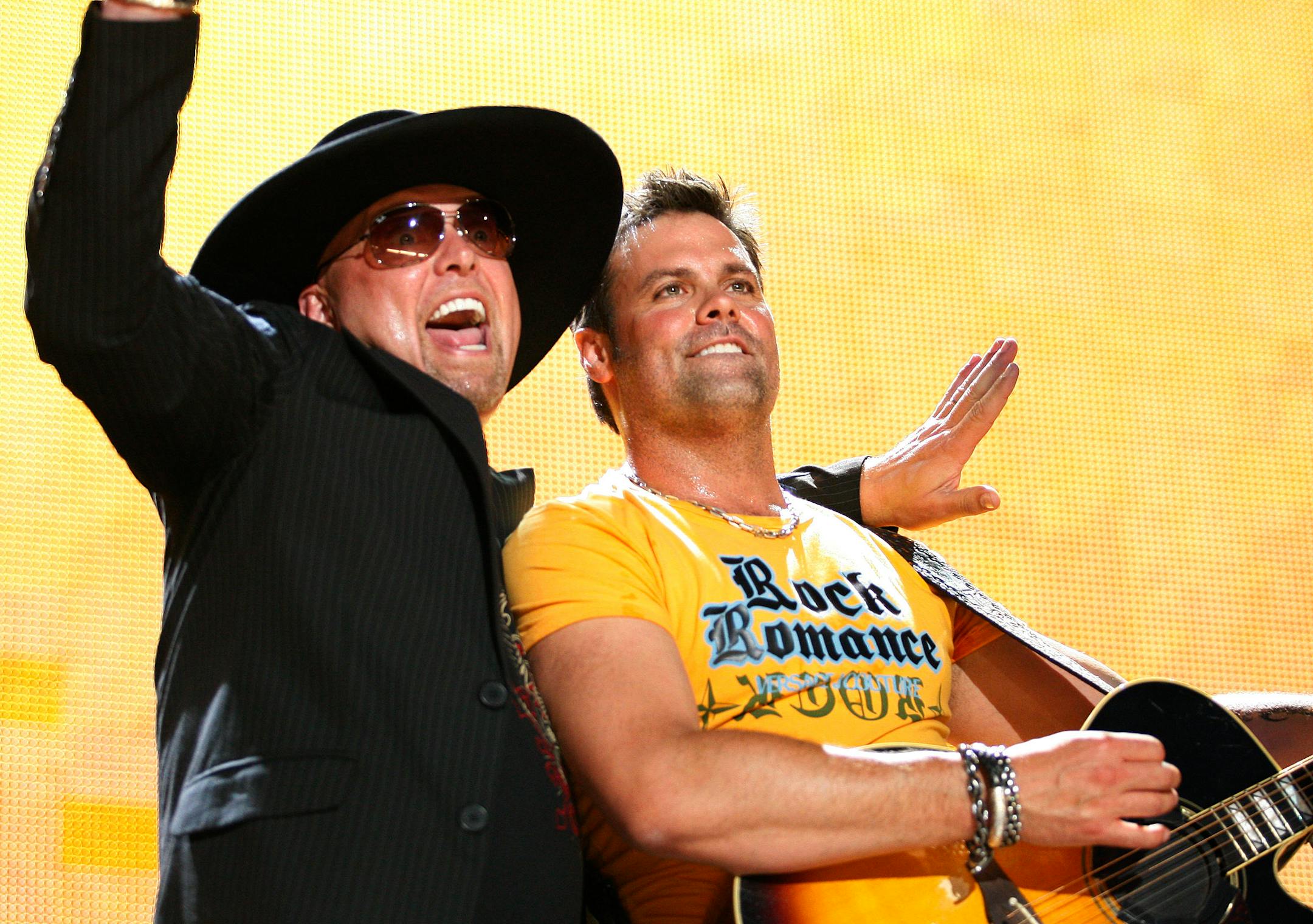 Country artists Eddie Montgomery and Troy Gentry of Montgomery Gentry perform at the CMA Music Festival Thursday, June 5, 2008, in Nashville, Tenn.