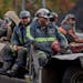 In this Oct. 15, 2014 photo, coal miners return on a buggy after working a shift underground at the Perkins Branch Coal Mine in Cumberland, Ky. As rec