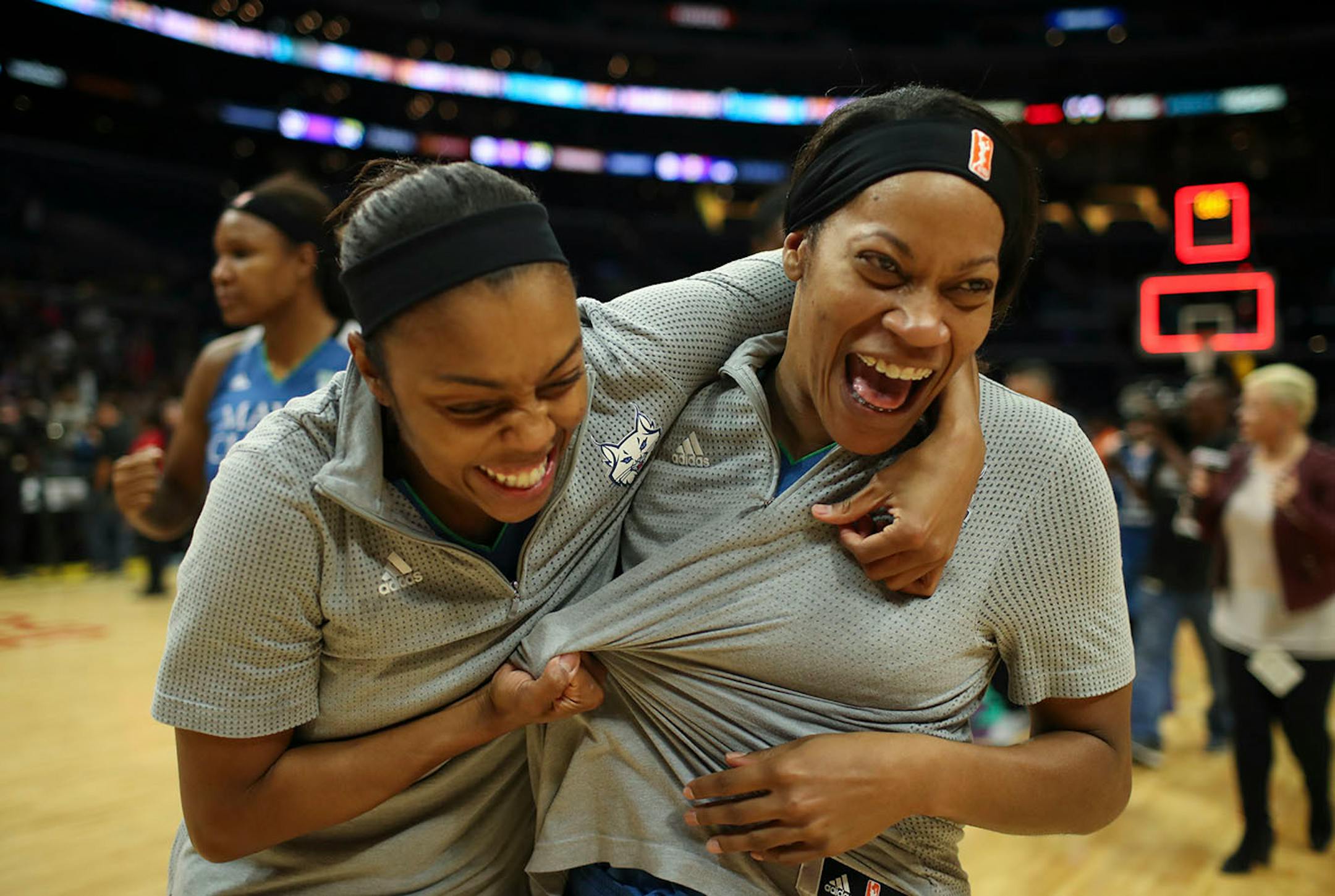 Minnesota Lynx guard Renee Montgomery, left, and Minnesota Lynx guard Jia Perkins celebrated the Lynx win as they walked off the court after the game.