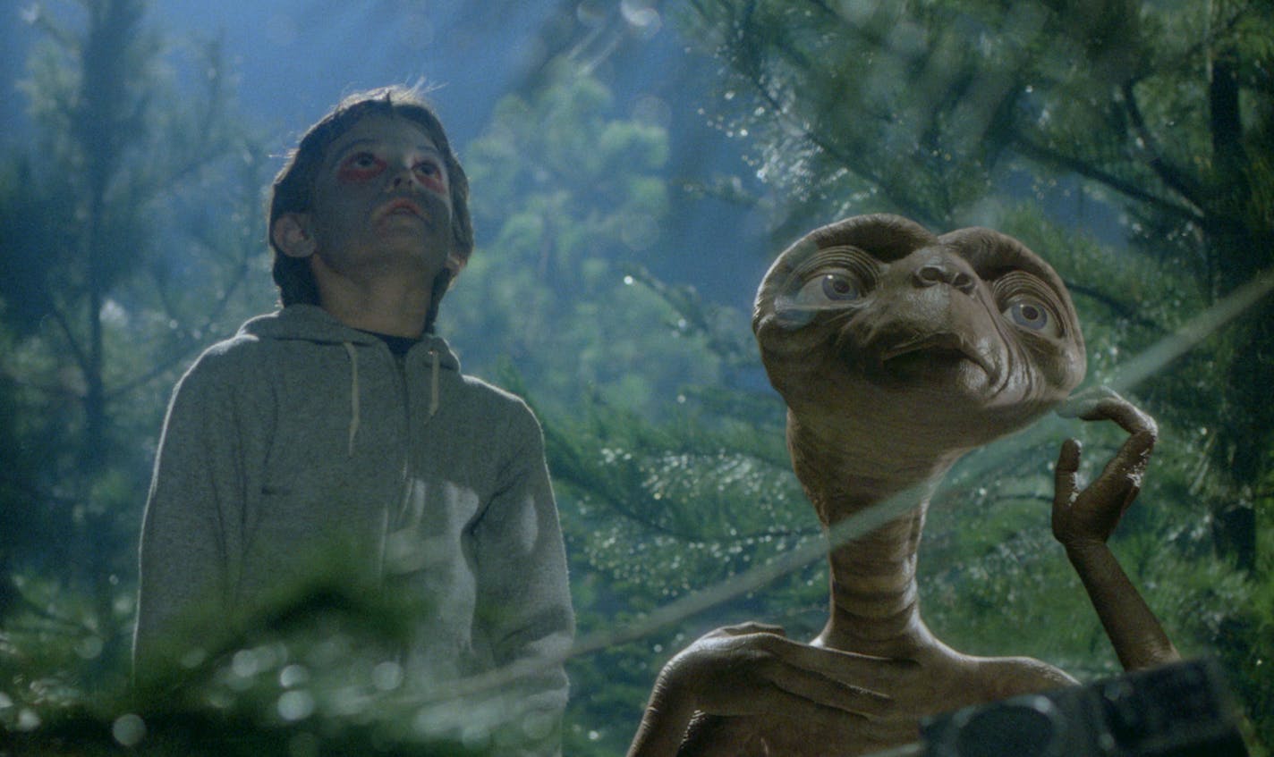 Elliott (Henry Thomas) tries to help E.T. phone home in "E.T. The Extra-Terrestrial."