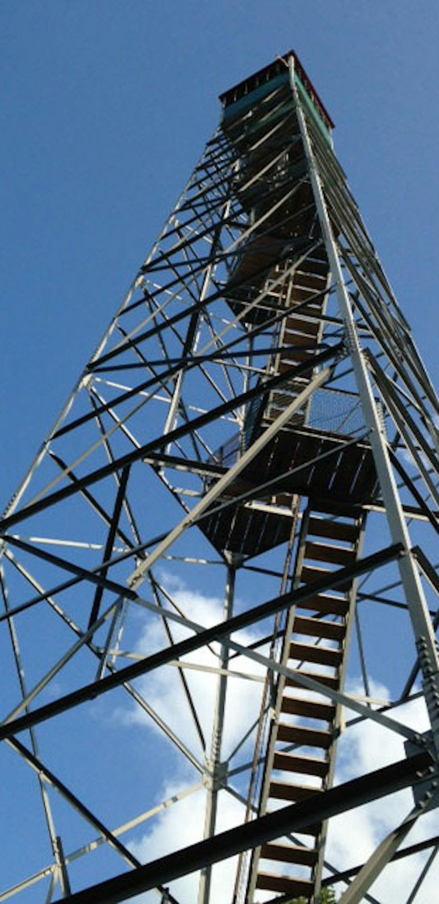 The Elba Fire Tower, just north of Whitewater State Park, is one of 10 National Historic Lookouts in Minnesota, and by far the southernmost. It's open for climbing April through October. There are 135 steps to the top of the tower. But just getting to the base of the tower requires ascending 637 steps cut into the bluffside. (Photo by Bill McAuliffe, special to the Star Tribune)