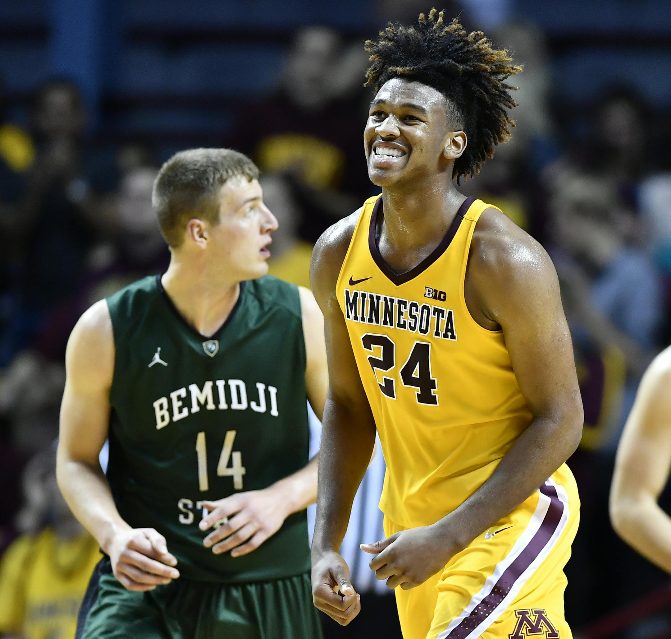 Minnesota Golden Gophers forward Eric Curry (24) celebrated after scoring a layup at the buzzer to end the first half, putting Minnesota up 38-29 over Bemidji State. ] (AARON LAVINSKY/STAR TRIBUNE) aaron.lavinsky@startribune.com The University of Minnesota Golden Gophers men's basketball team played the Bemidji State Beavers on Thursday, Nov. 3, 2016 at Williams Arena in Minneapolis, Minn.